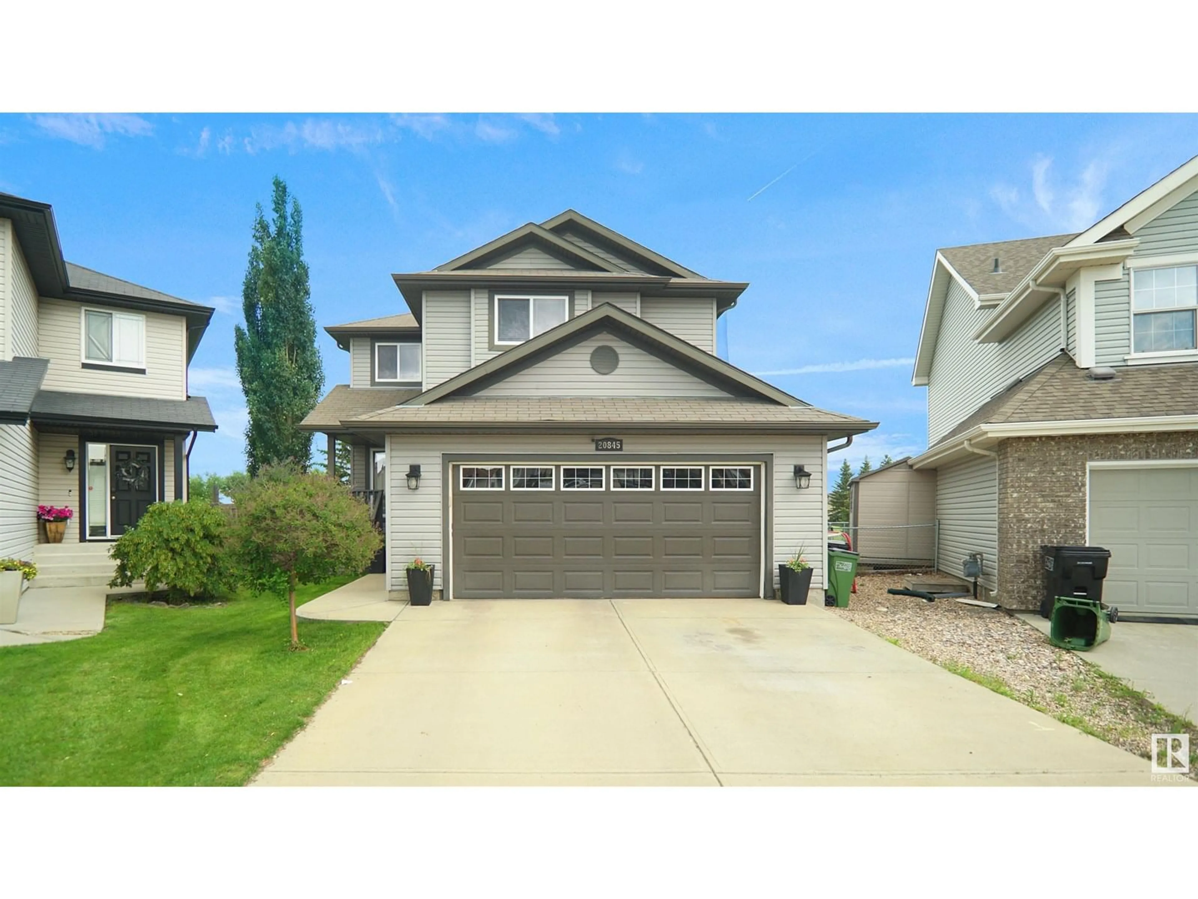 Home with vinyl exterior material, street for 20845 92A AV, Edmonton Alberta T5T3Z1
