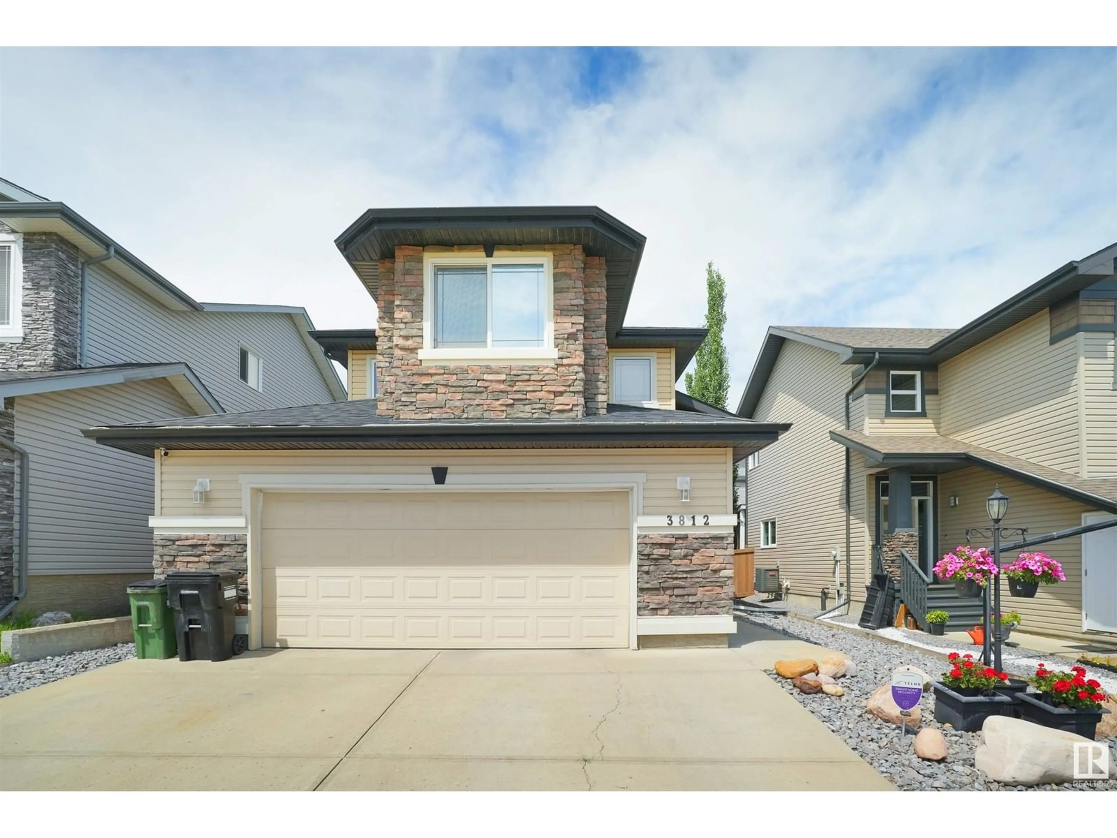 Home with brick exterior material, street for 3812 163 AV, Edmonton Alberta T5Y0G6