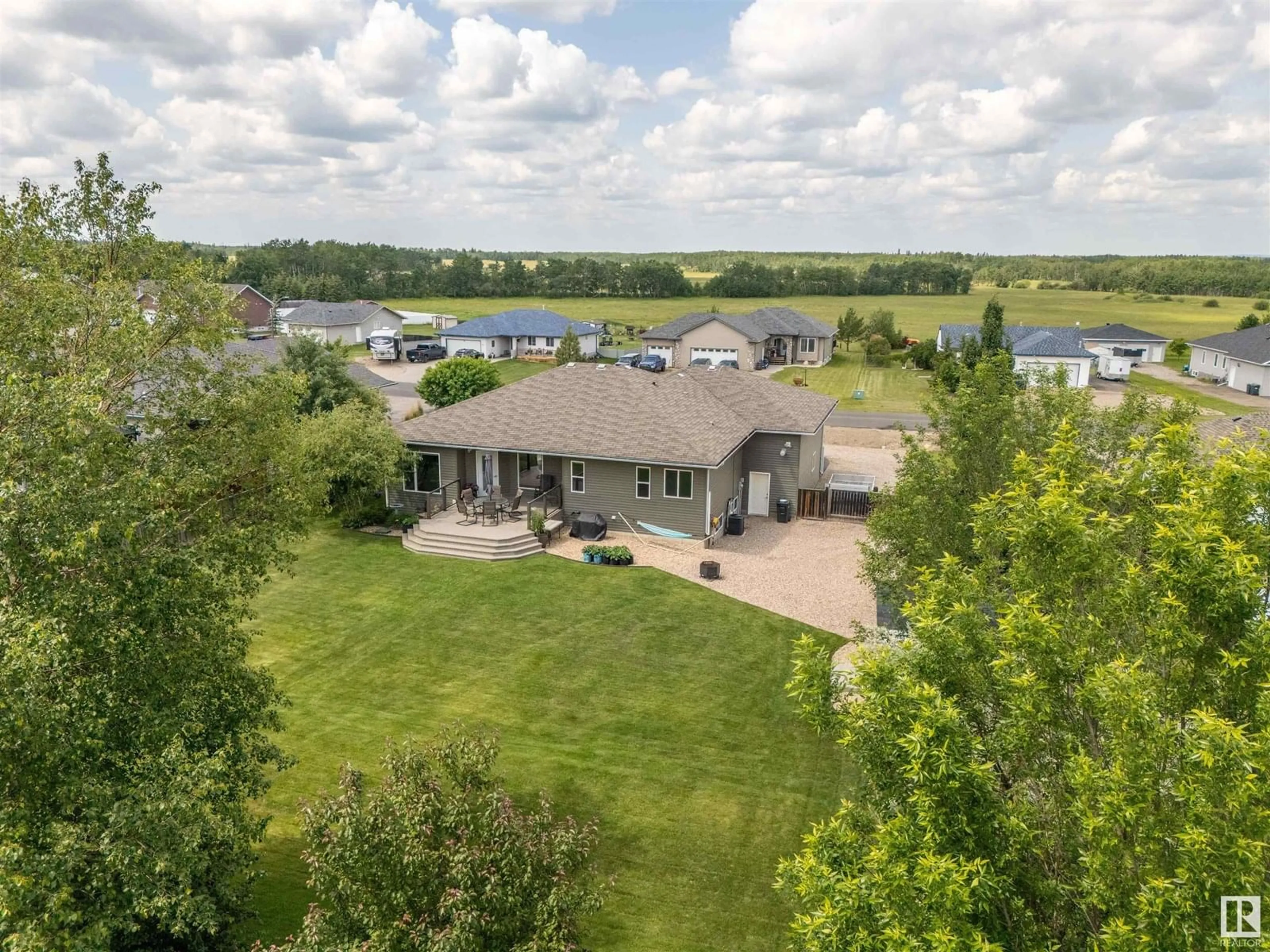 A pic from outside/outdoor area/front of a property/back of a property/a pic from drone, water/lake/river/ocean view for 3025 RED FOX DR, Cold Lake Alberta T9M1N9