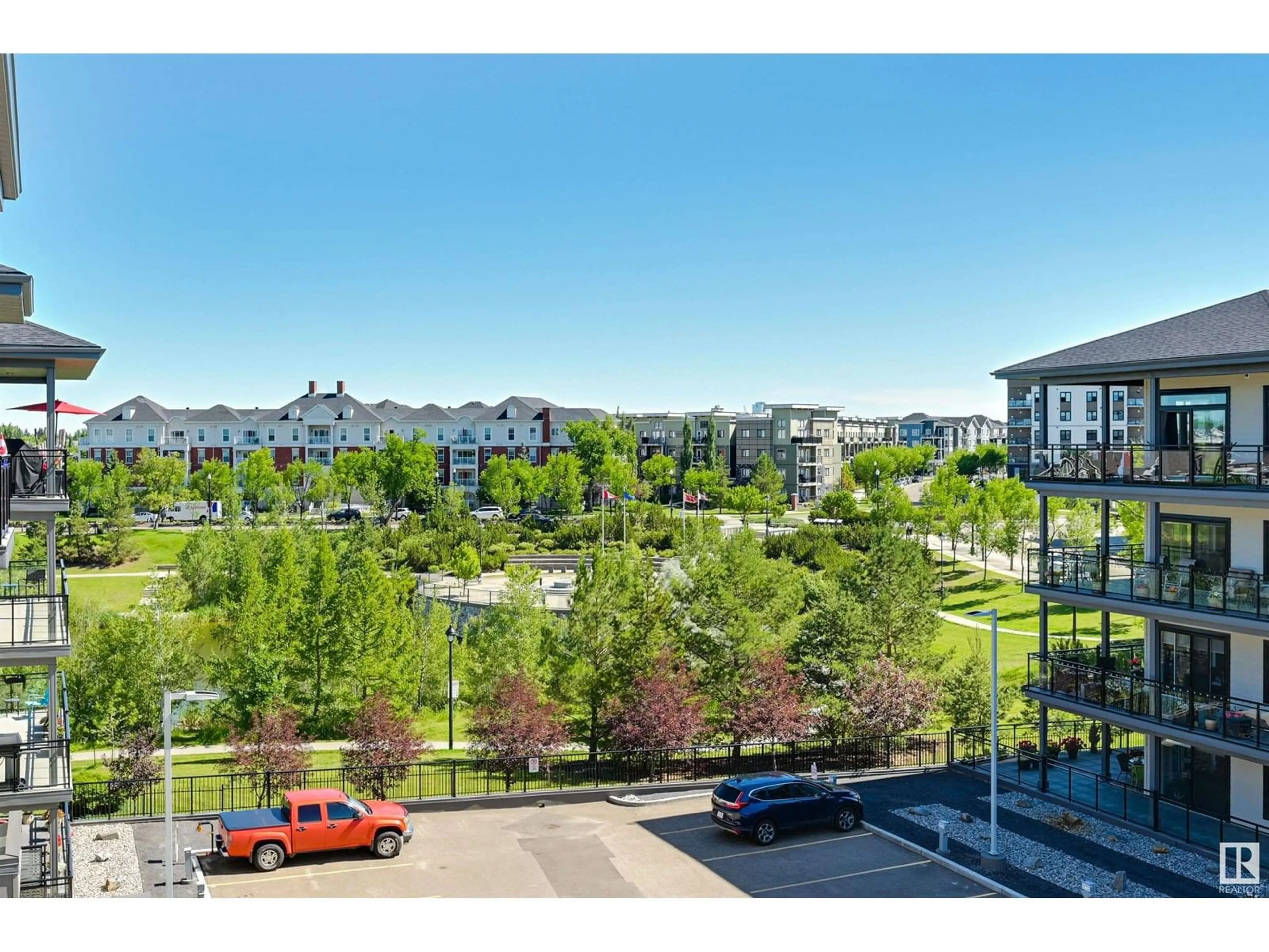 A pic from outside/outdoor area/front of a property/back of a property/a pic from drone, city buildings view from balcony for #406 - 528 GRIESBACH PARADE, Edmonton Alberta T5E6X2