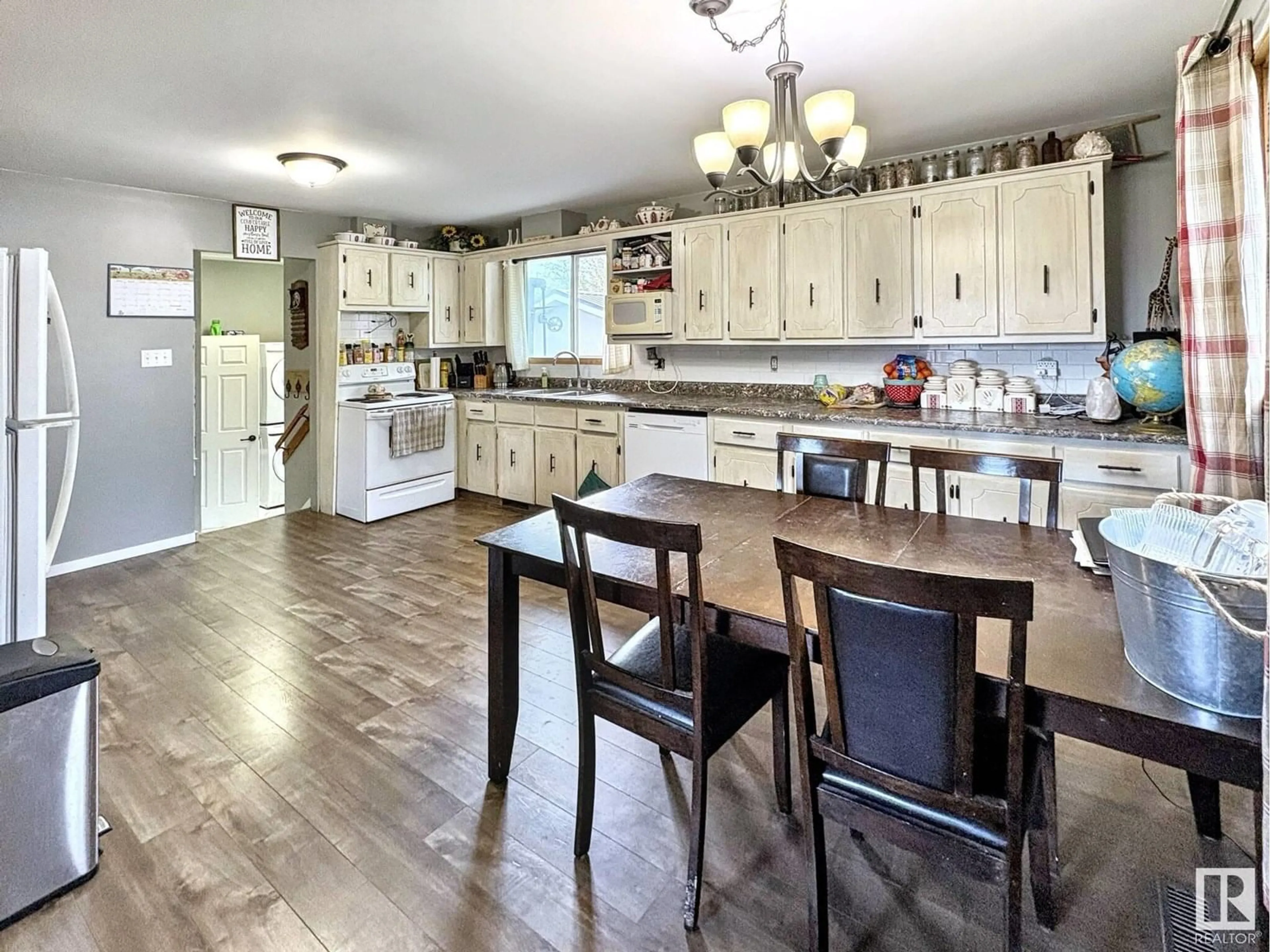 Open concept kitchen, wood/laminate floor for 5025 54 ST, Glendon Alberta T0A1P0