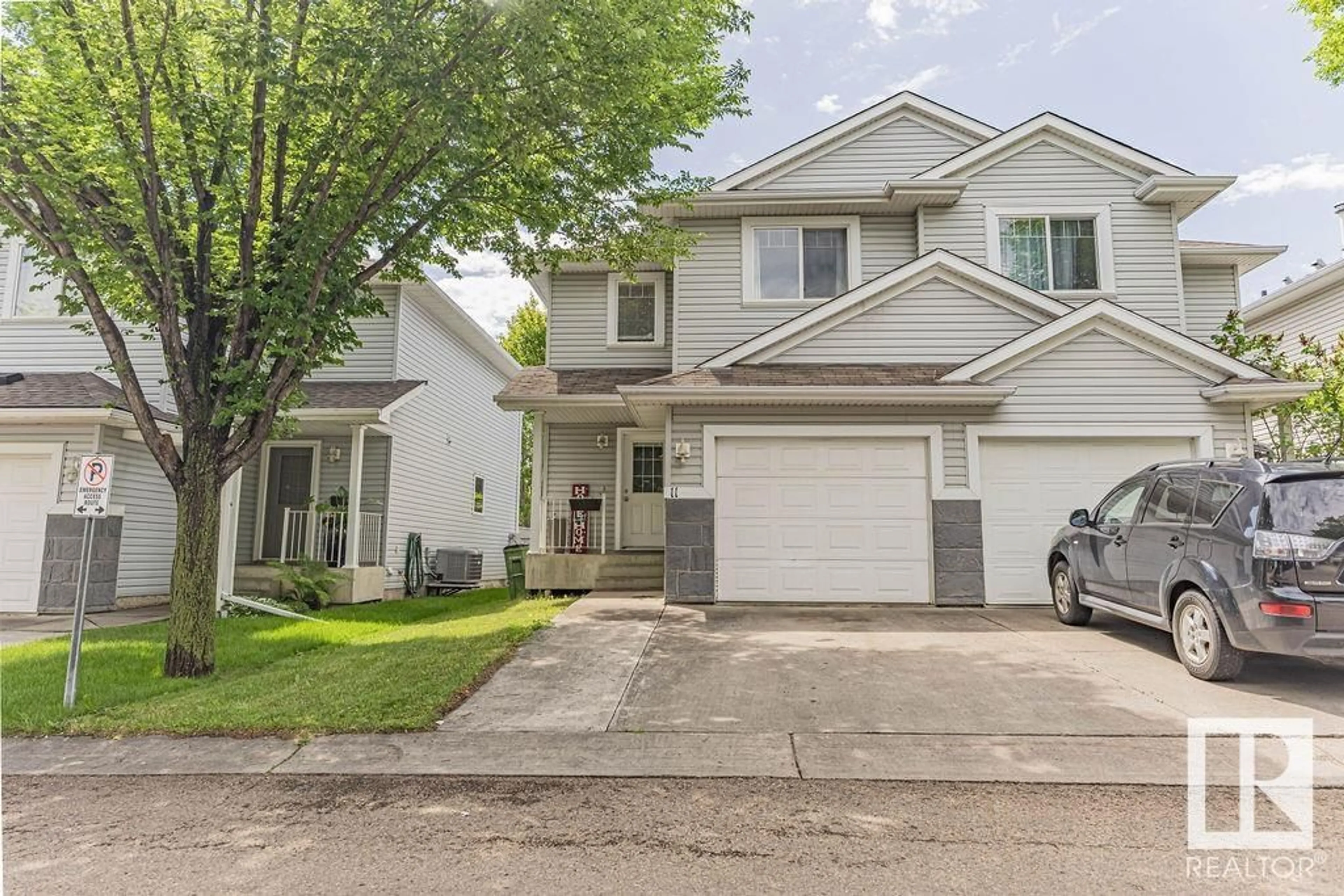 Home with vinyl exterior material, street for #11 - 4350 23 ST, Edmonton Alberta T6T1X8