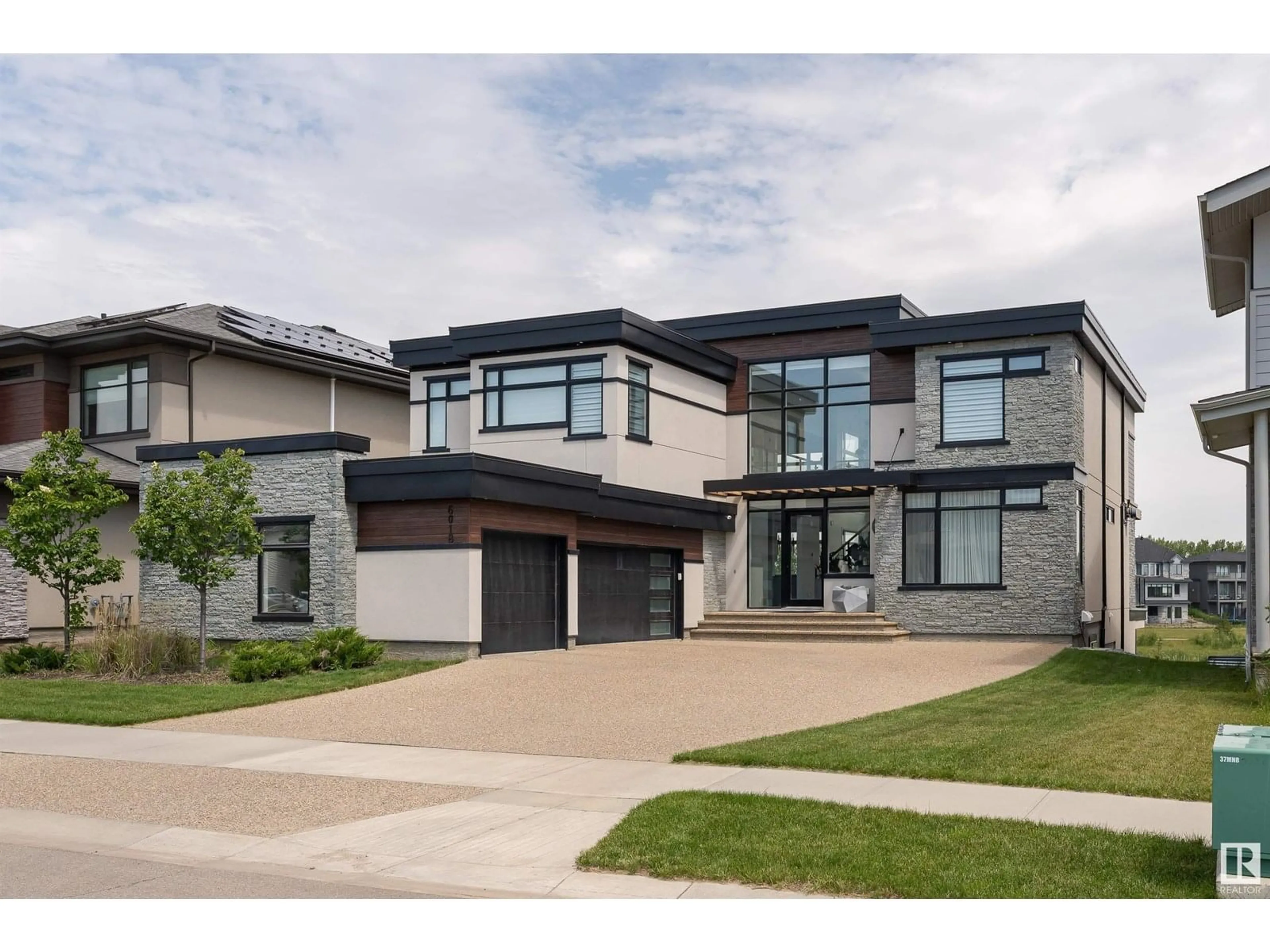 Home with brick exterior material, street for 6018 CRAWFORD DR, Edmonton Alberta T6W3Y5