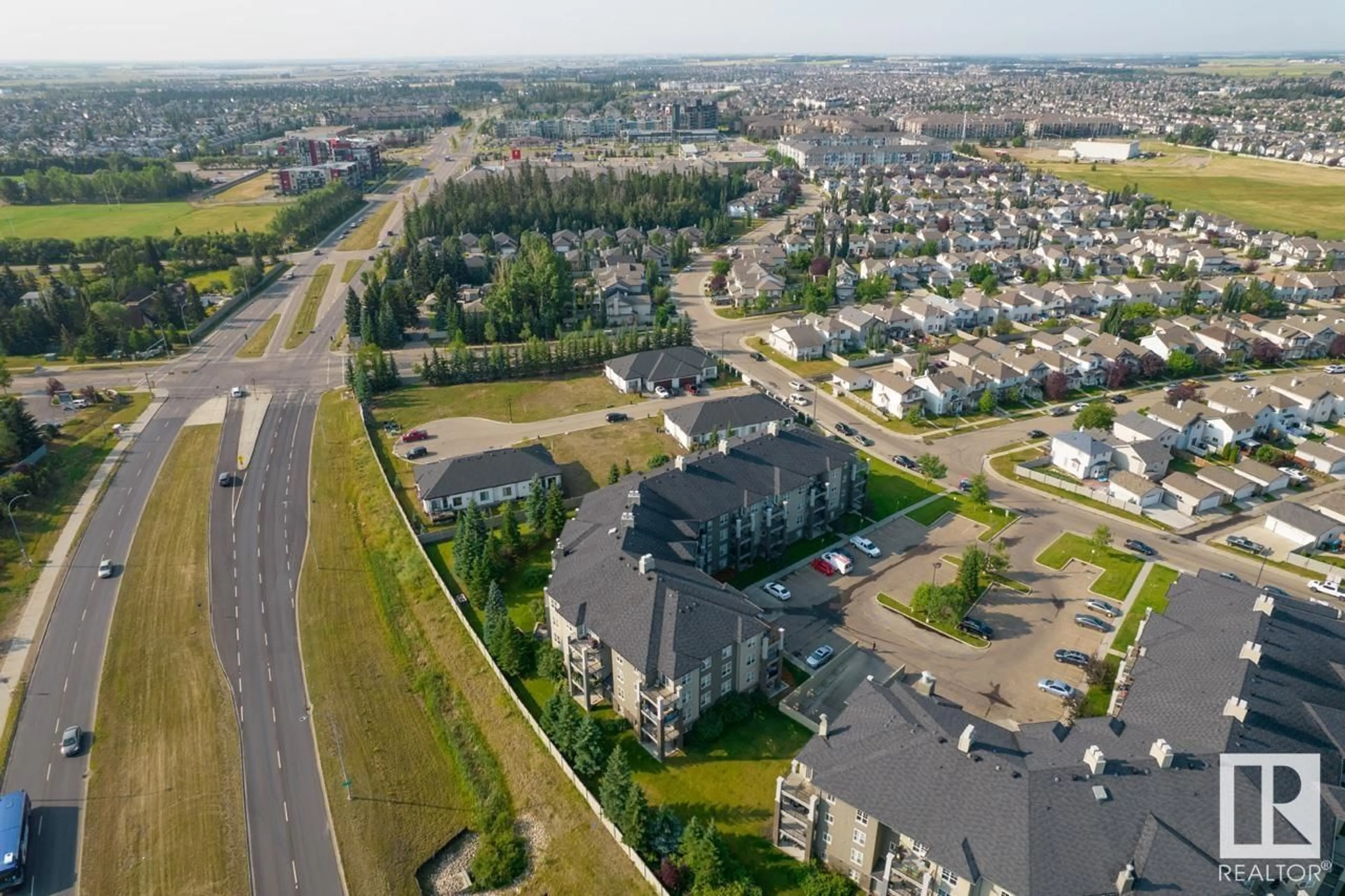 A pic from outside/outdoor area/front of a property/back of a property/a pic from drone, unknown for #412 - 630 MCALLISTER LO, Edmonton Alberta T6W1N3