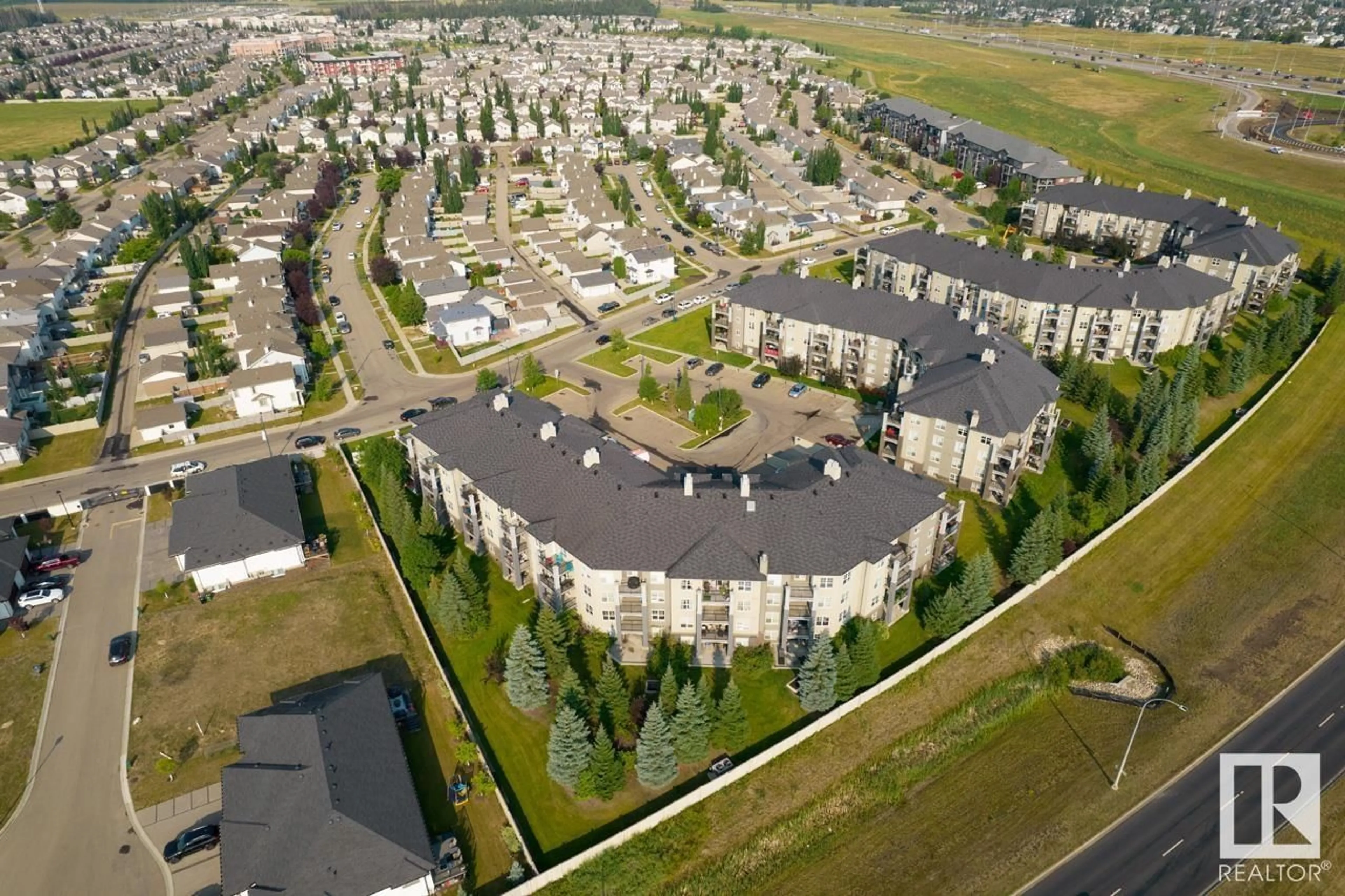 A pic from outside/outdoor area/front of a property/back of a property/a pic from drone, unknown for #412 - 630 MCALLISTER LO, Edmonton Alberta T6W1N3