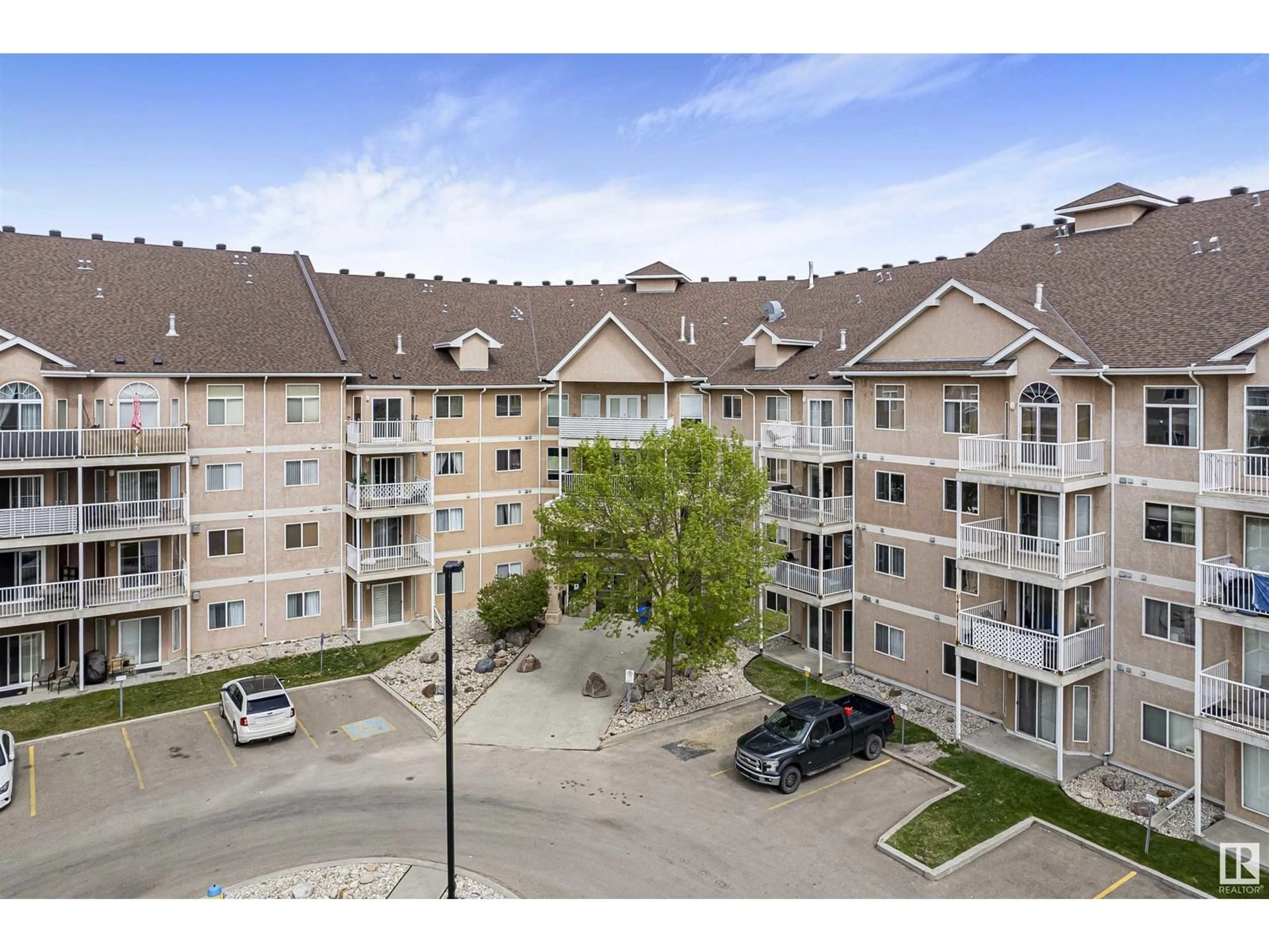 A pic from outside/outdoor area/front of a property/back of a property/a pic from drone, unknown for #213 - 4312 139 AV, Edmonton Alberta T5Y3J4