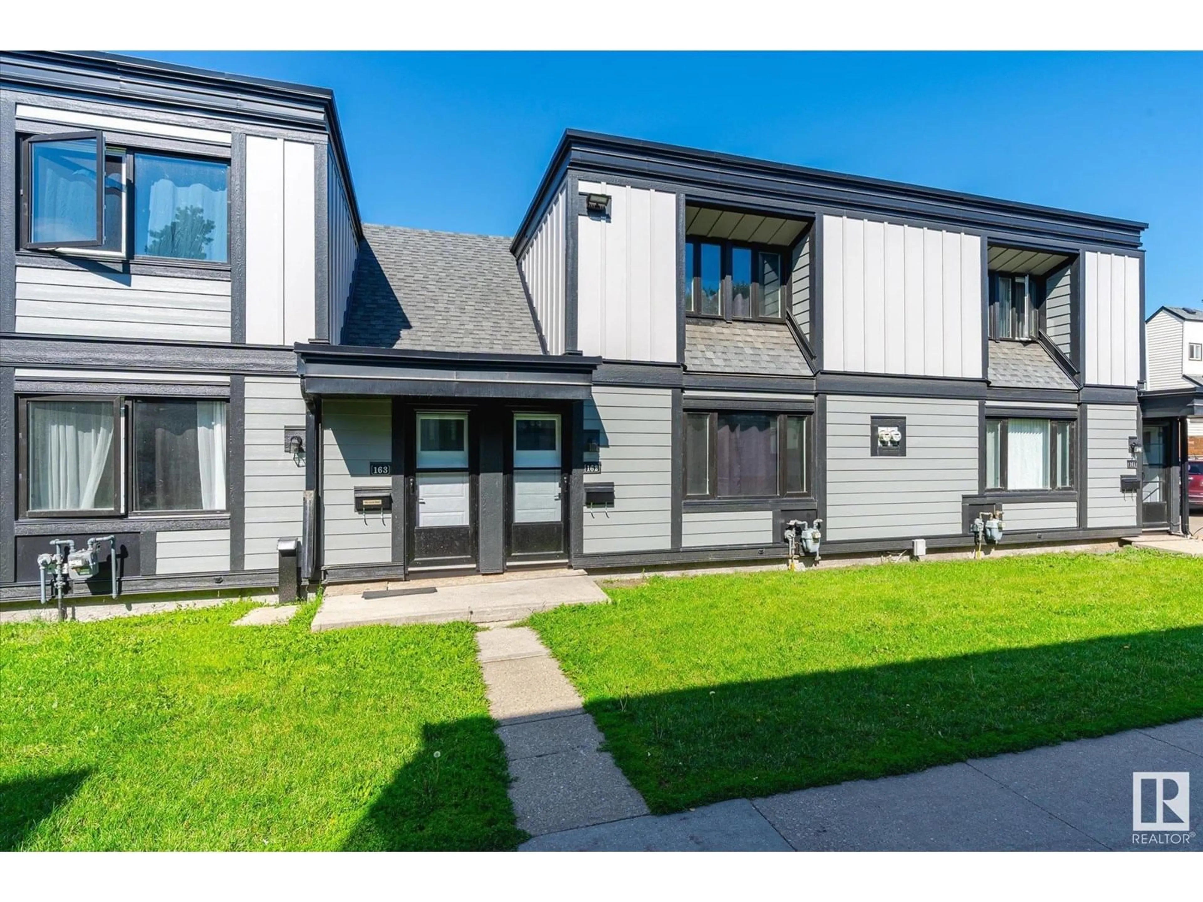 Home with vinyl exterior material, street for #162 - 3308 113 AV, Edmonton Alberta T5W5J8