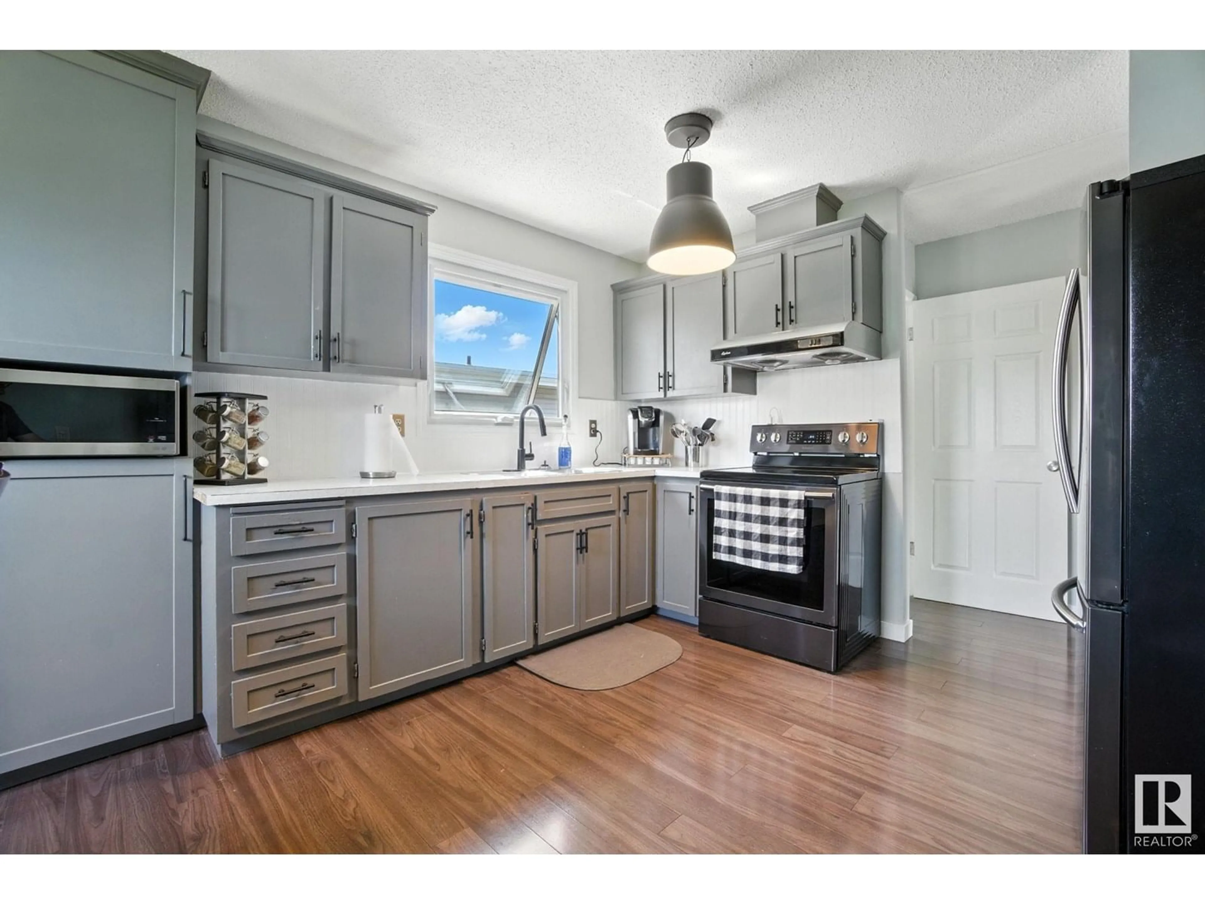 Open concept kitchen, unknown for 9403 149 AV, Edmonton Alberta T5E5W4