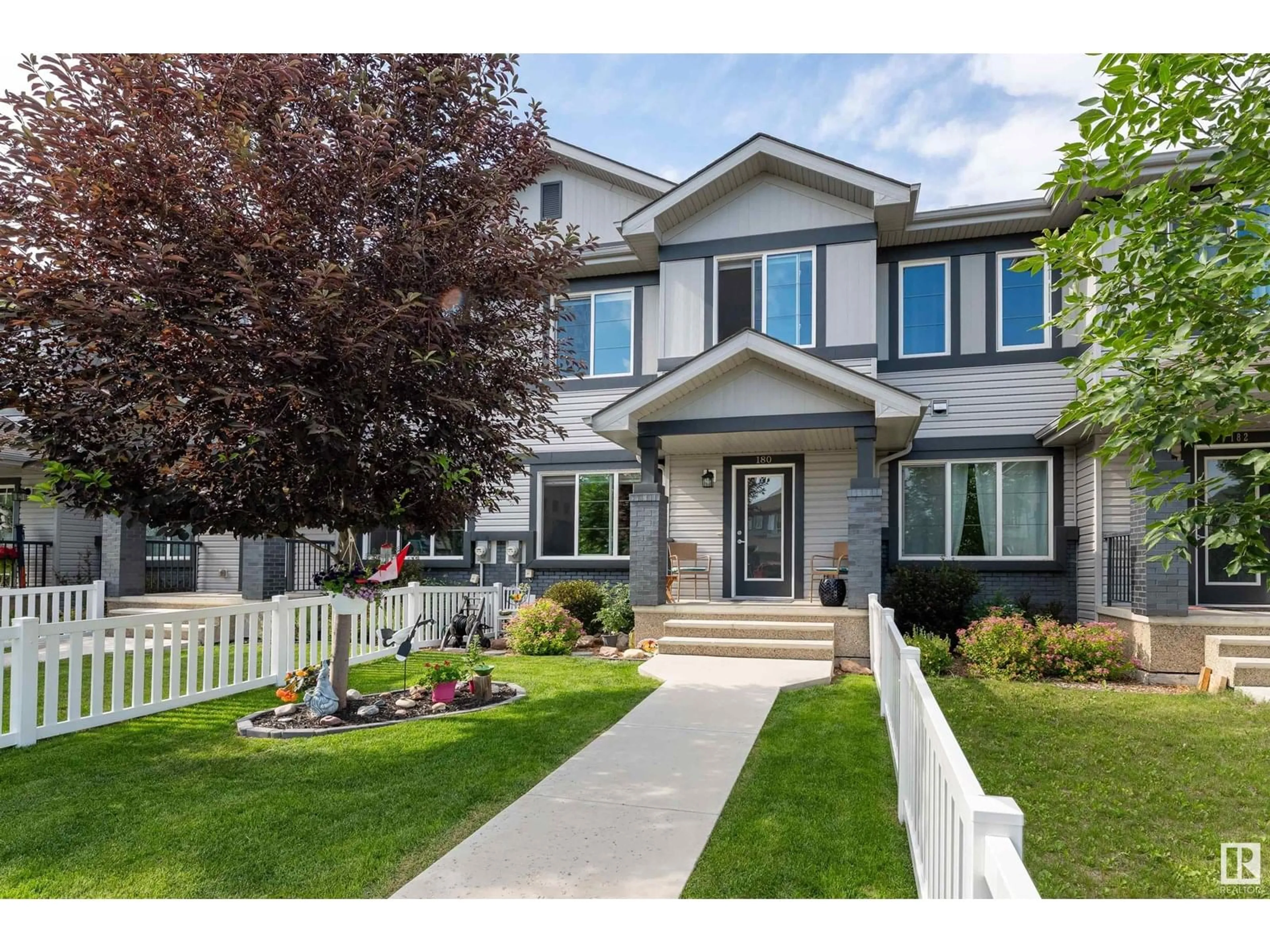 Home with vinyl exterior material, street for 180 SANTANA CR, Fort Saskatchewan Alberta T8L0T4