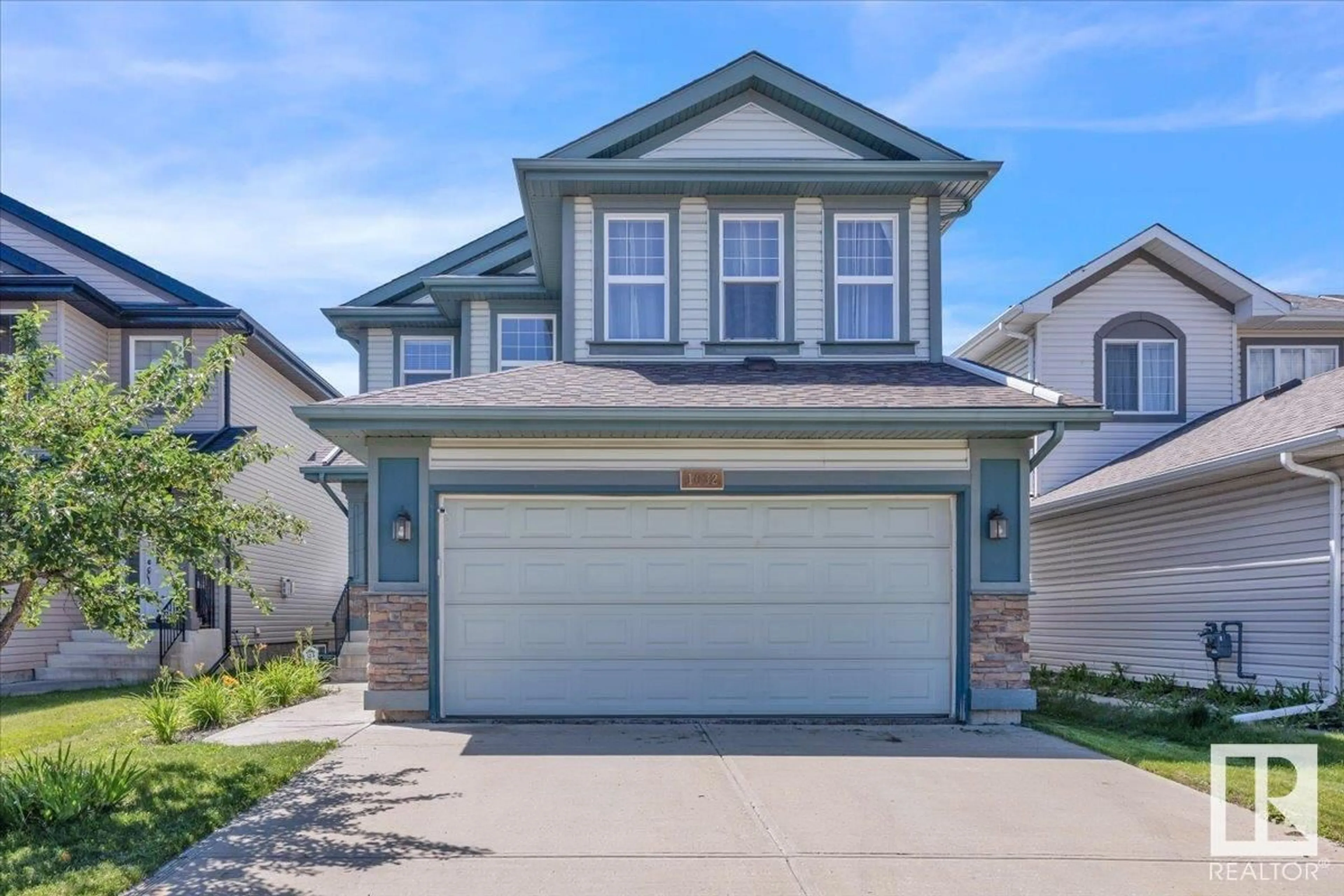 Home with vinyl exterior material, street for SW - 1032 118A ST, Edmonton Alberta T6W0B8