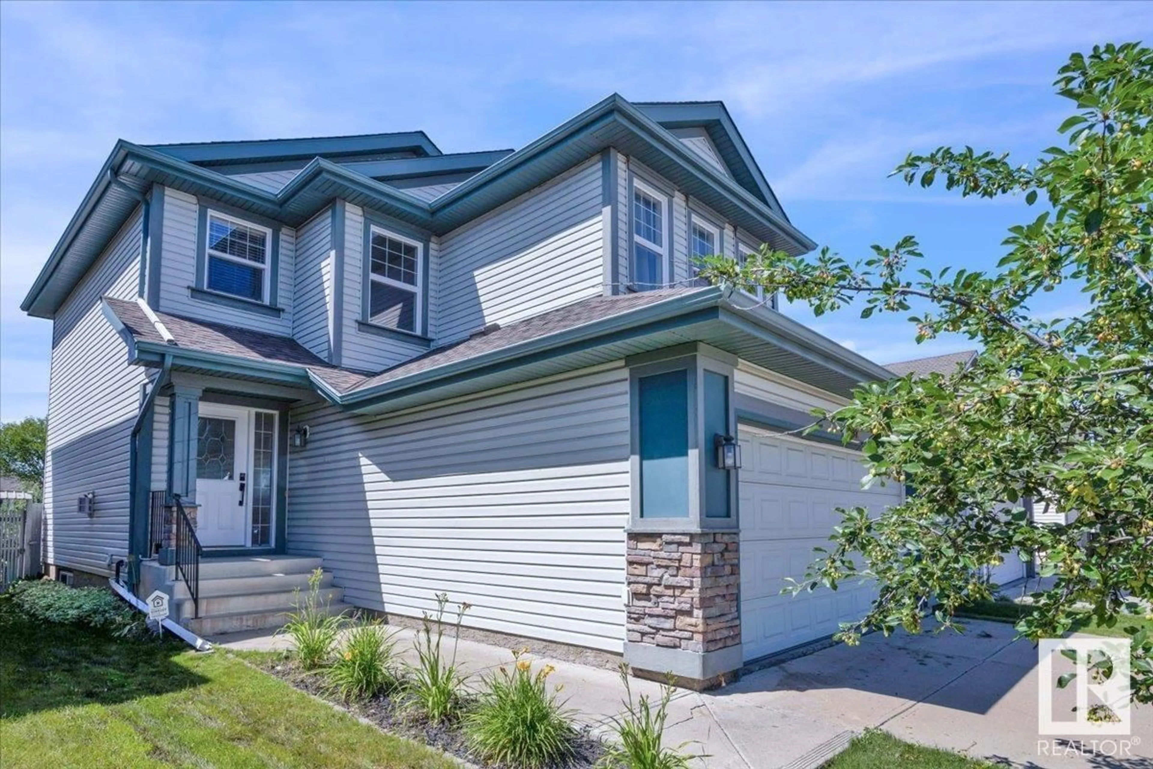 Home with vinyl exterior material, street for SW - 1032 118A ST, Edmonton Alberta T6W0B8