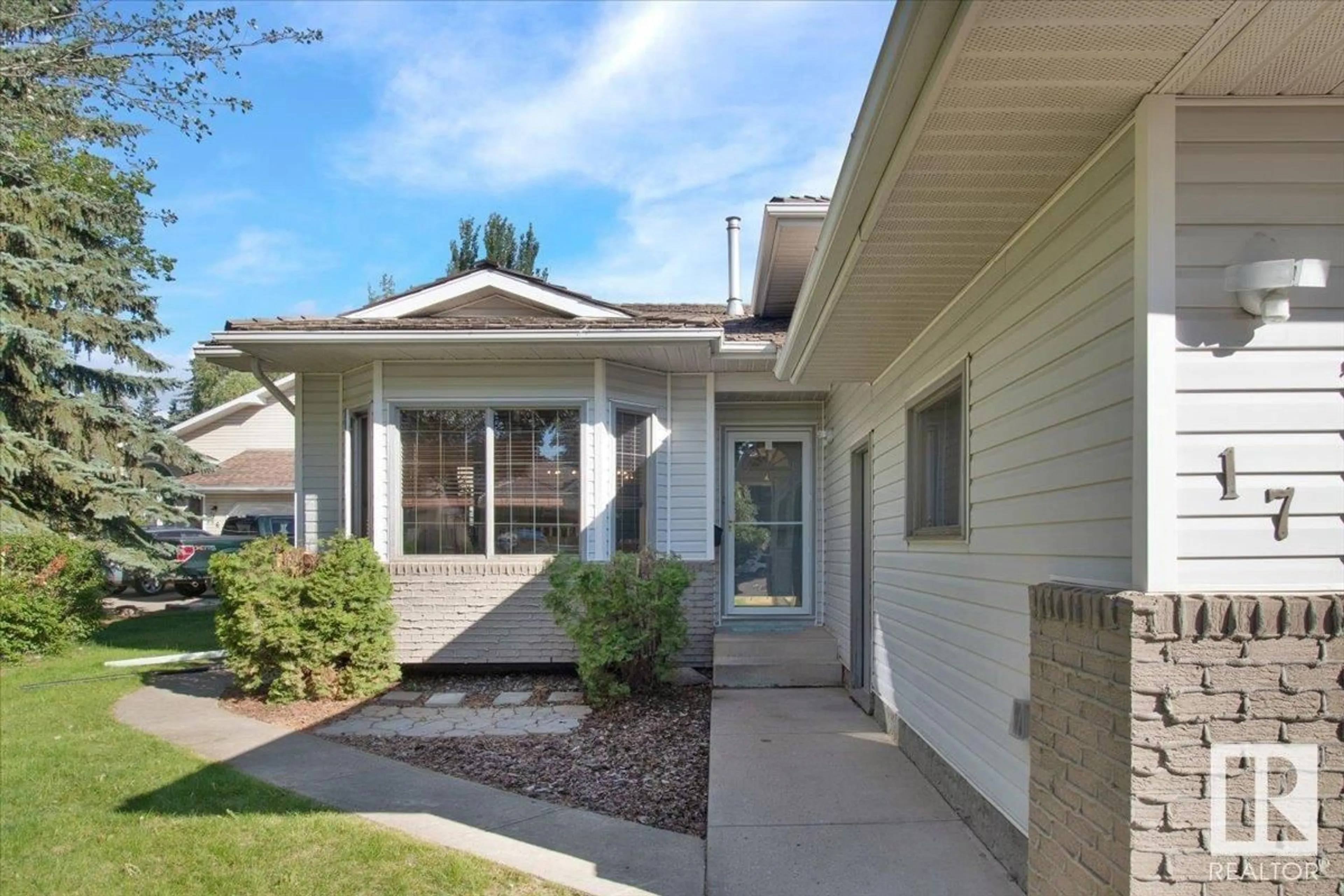 Home with vinyl exterior material, street for 17 EMERALD, St. Albert Alberta T8N5S4