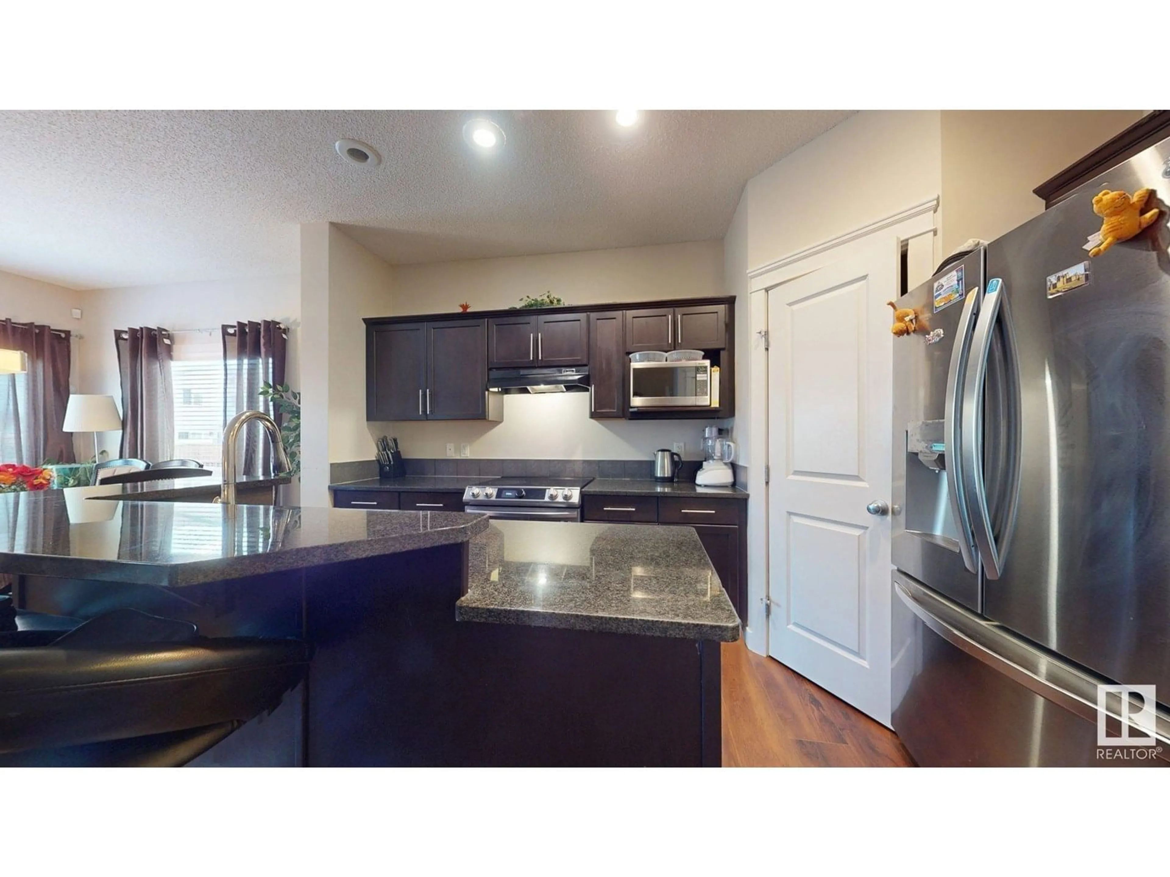 Open concept kitchen, unknown for 2917 16 A AV, Edmonton Alberta T6T0P8