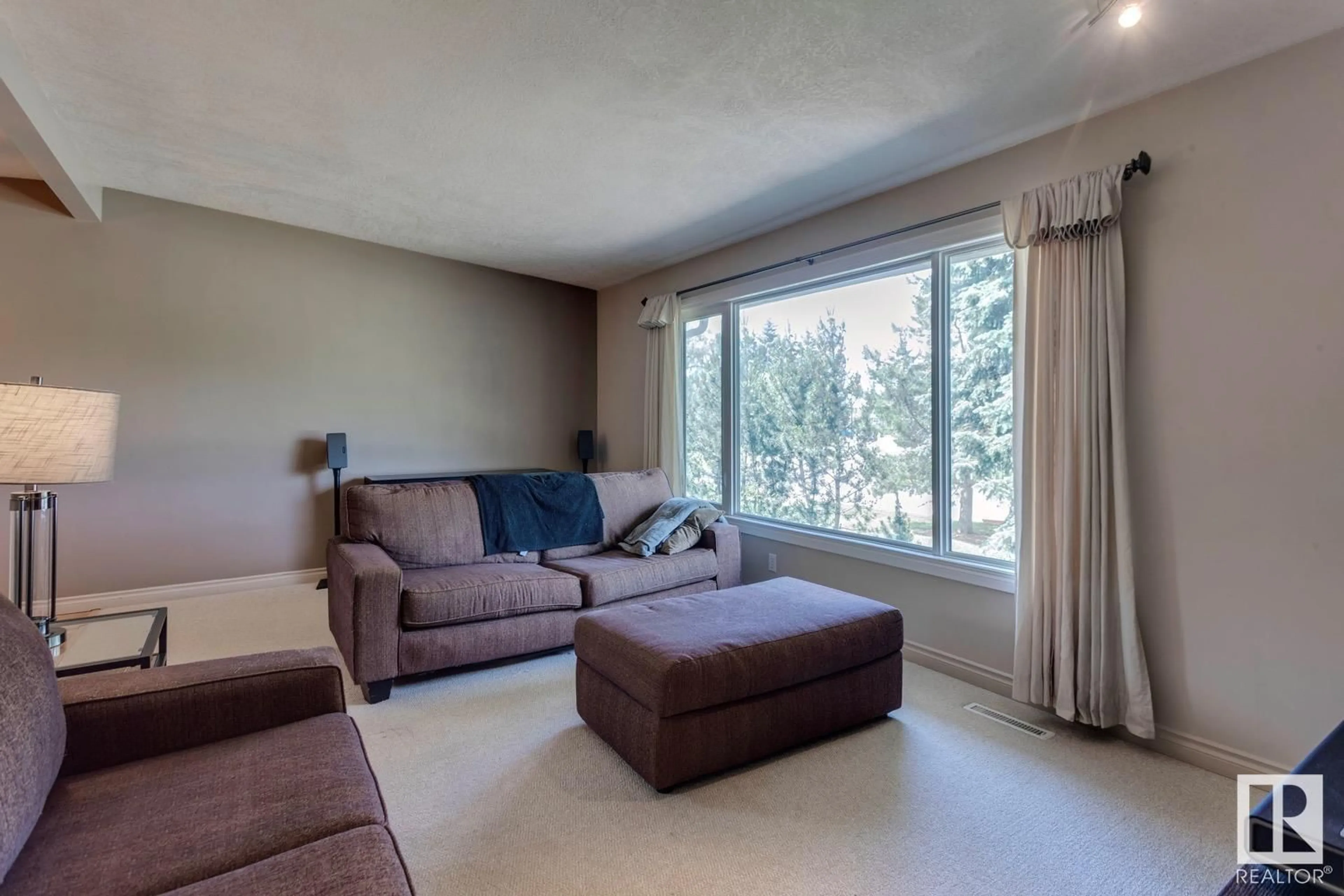 Living room with furniture, unknown for 11211 48 AV, Edmonton Alberta T6H0C8