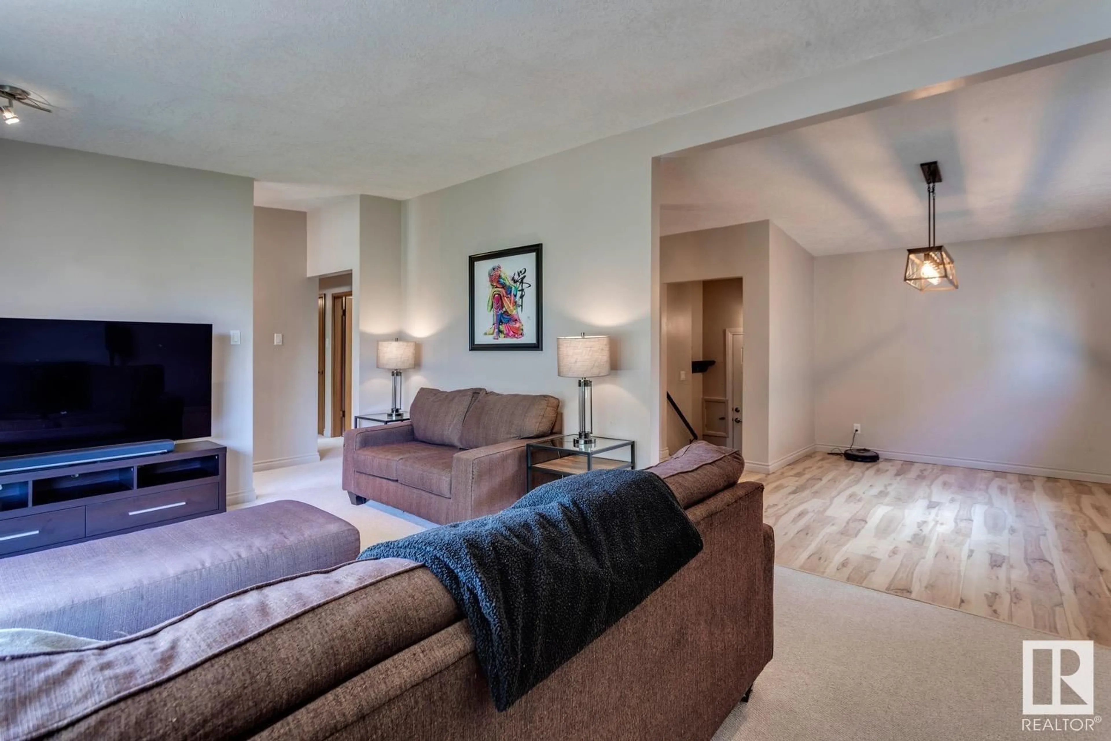 Living room with furniture, unknown for 11211 48 AV, Edmonton Alberta T6H0C8