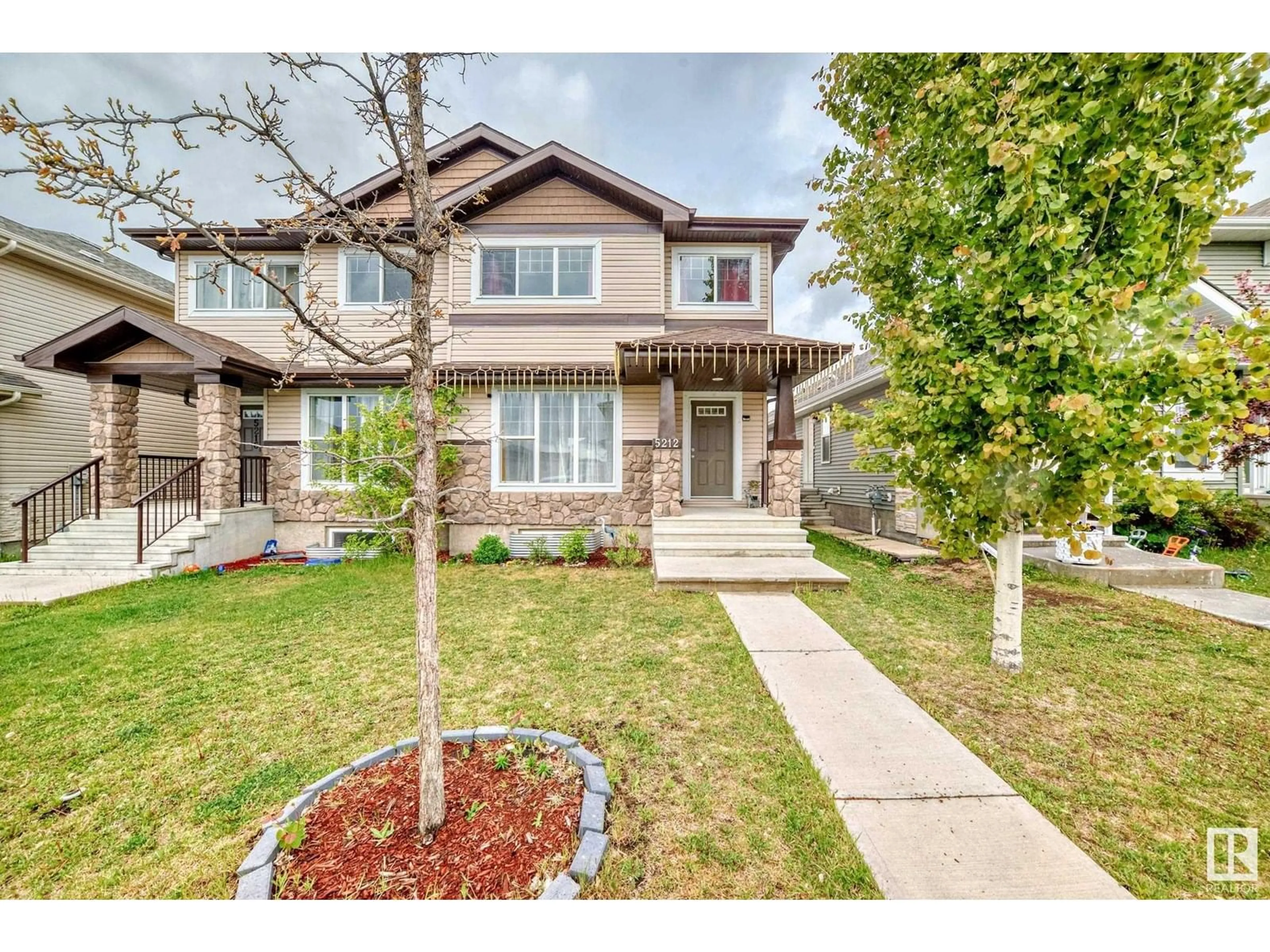 Home with brick exterior material, street for SW SW - 5212 21 AV, Edmonton Alberta T6X1V6