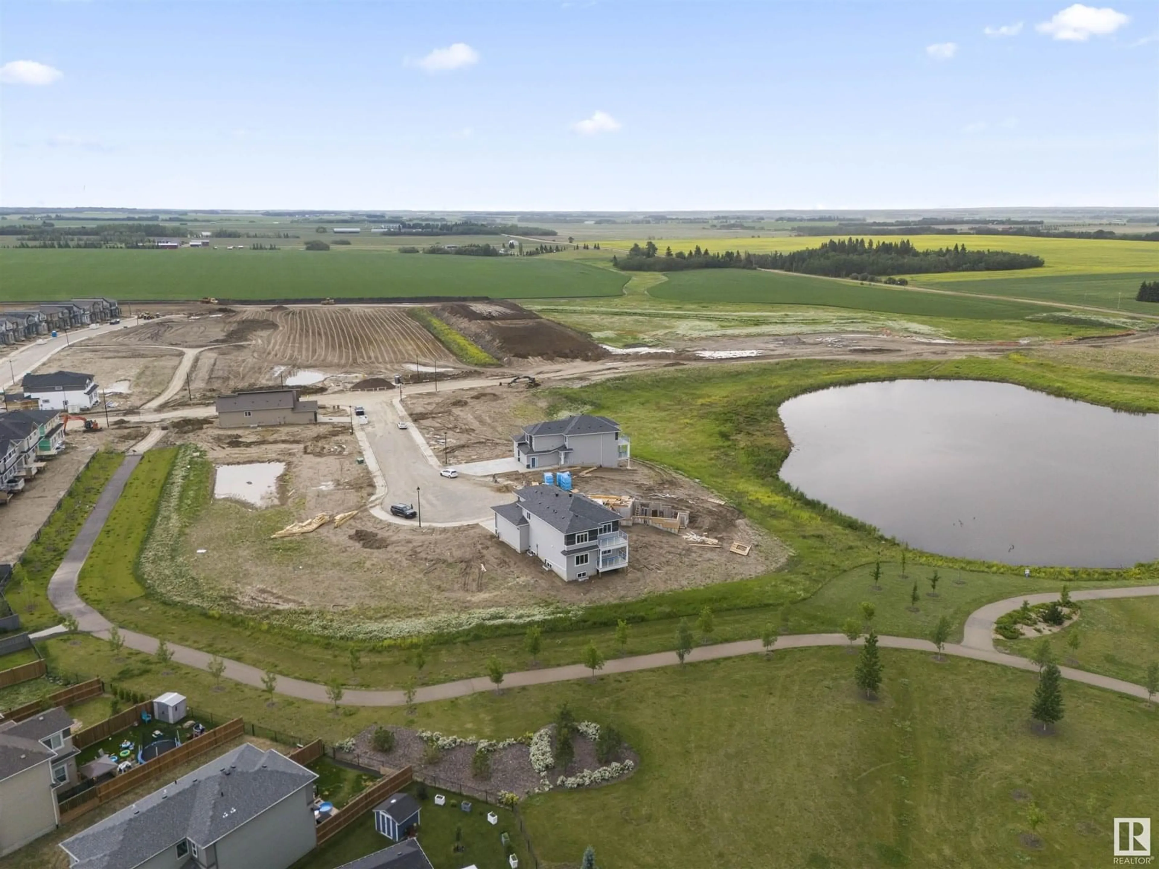 A pic from outside/outdoor area/front of a property/back of a property/a pic from drone, building for 216 BASIN CO, Leduc Alberta T2R0A2