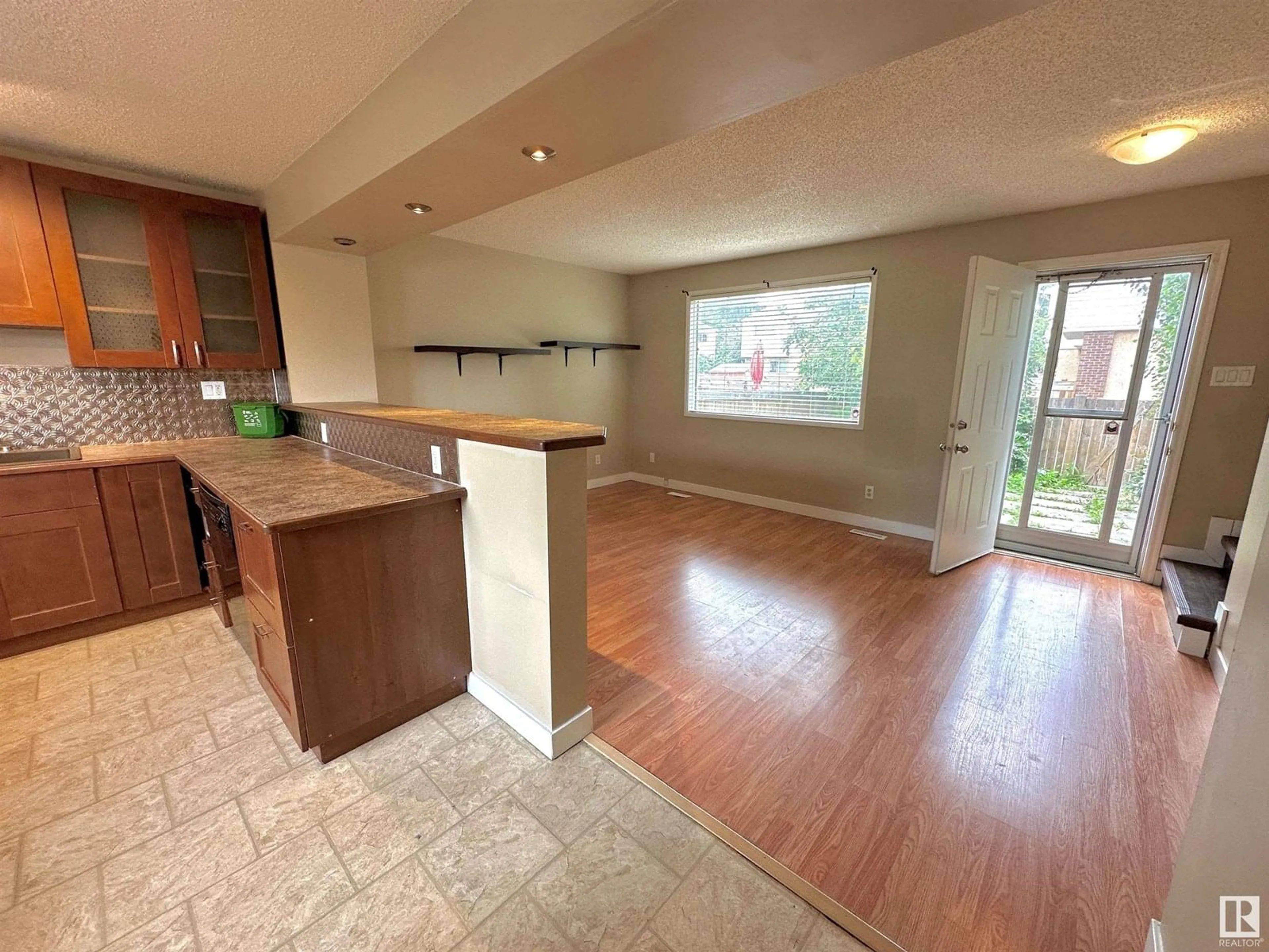 Open concept kitchen, unknown for NW - 1527 KNOTTWOOD N, Edmonton Alberta T6K2B8