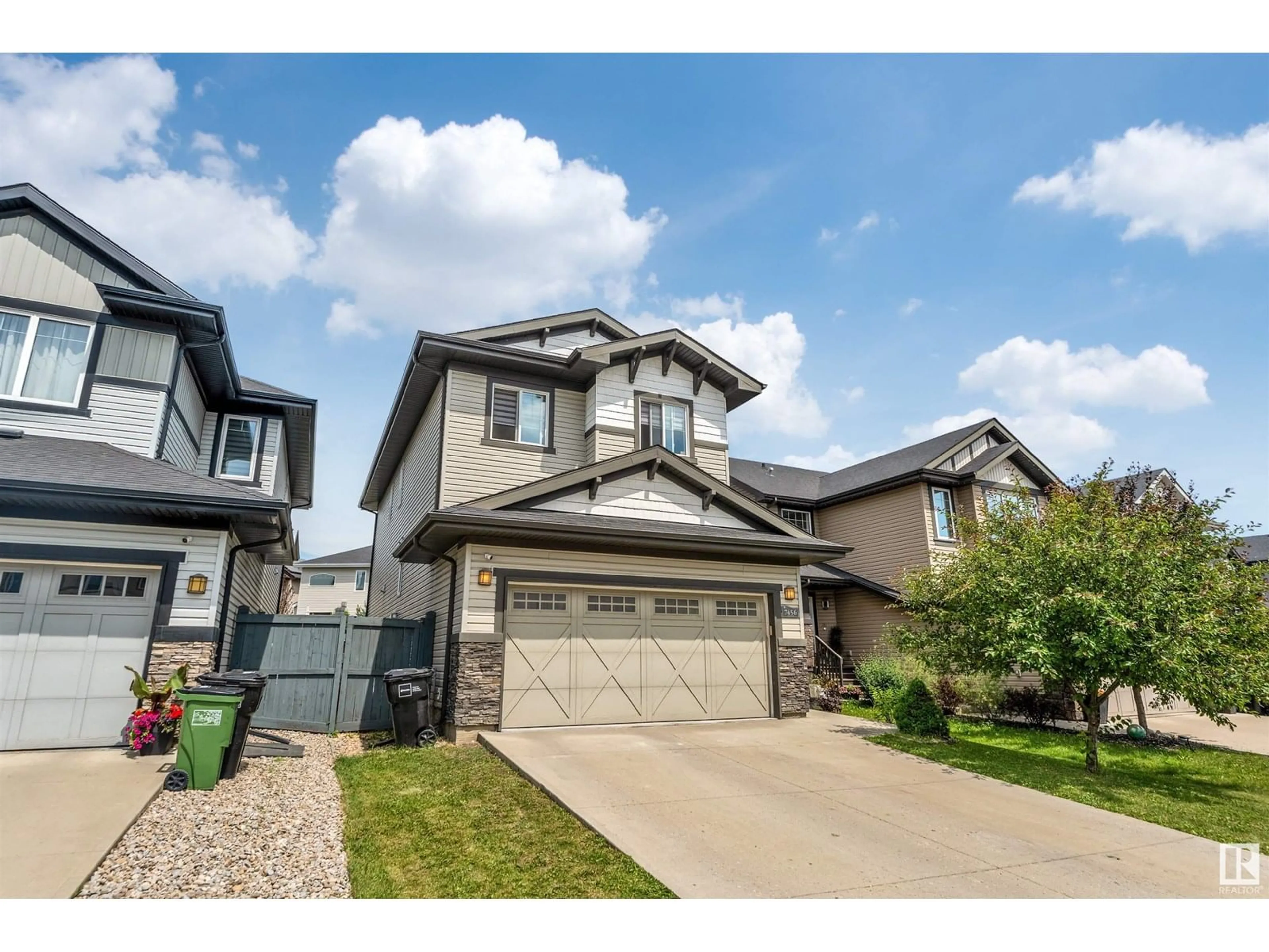 Home with vinyl exterior material, street for 7456 GETTY WY, Edmonton Alberta T5T4T3