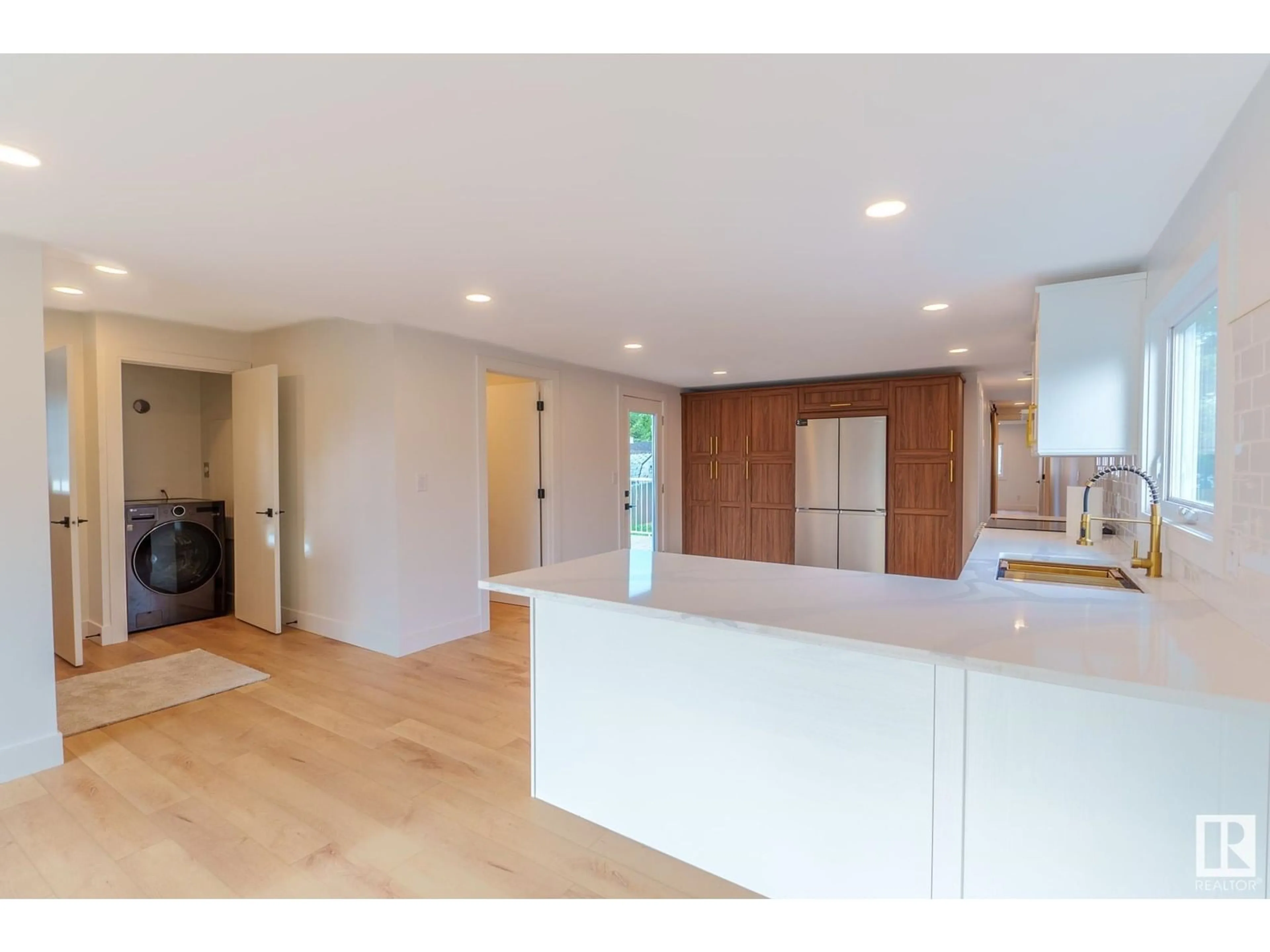 Open concept kitchen, wood/laminate floor for 1431 LAKEWOOD CRES, Sherwood Park Alberta T8H1K7