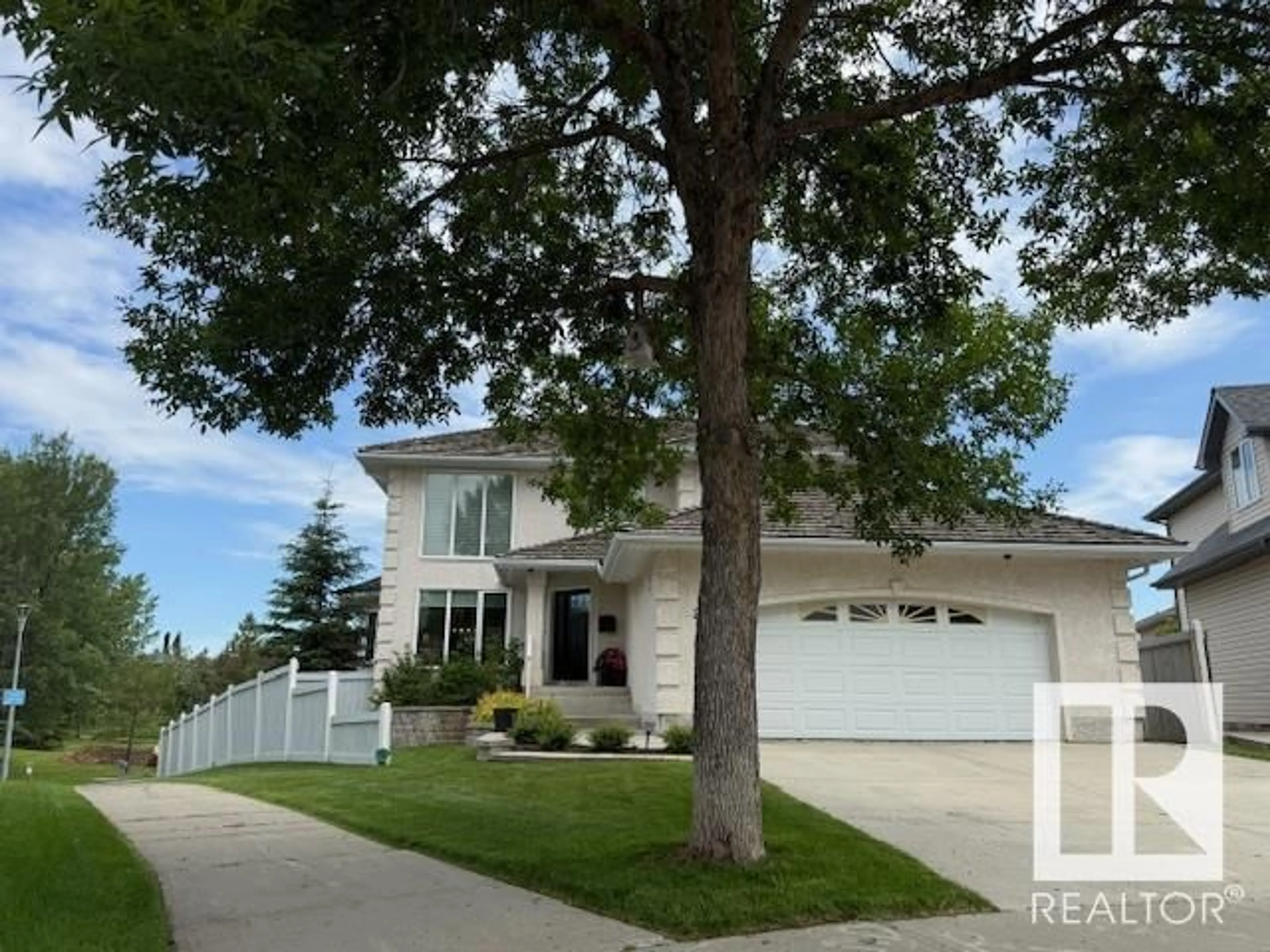 Home with vinyl exterior material, street for 227 ORMSBY RD E NW, Edmonton Alberta T5T5X5