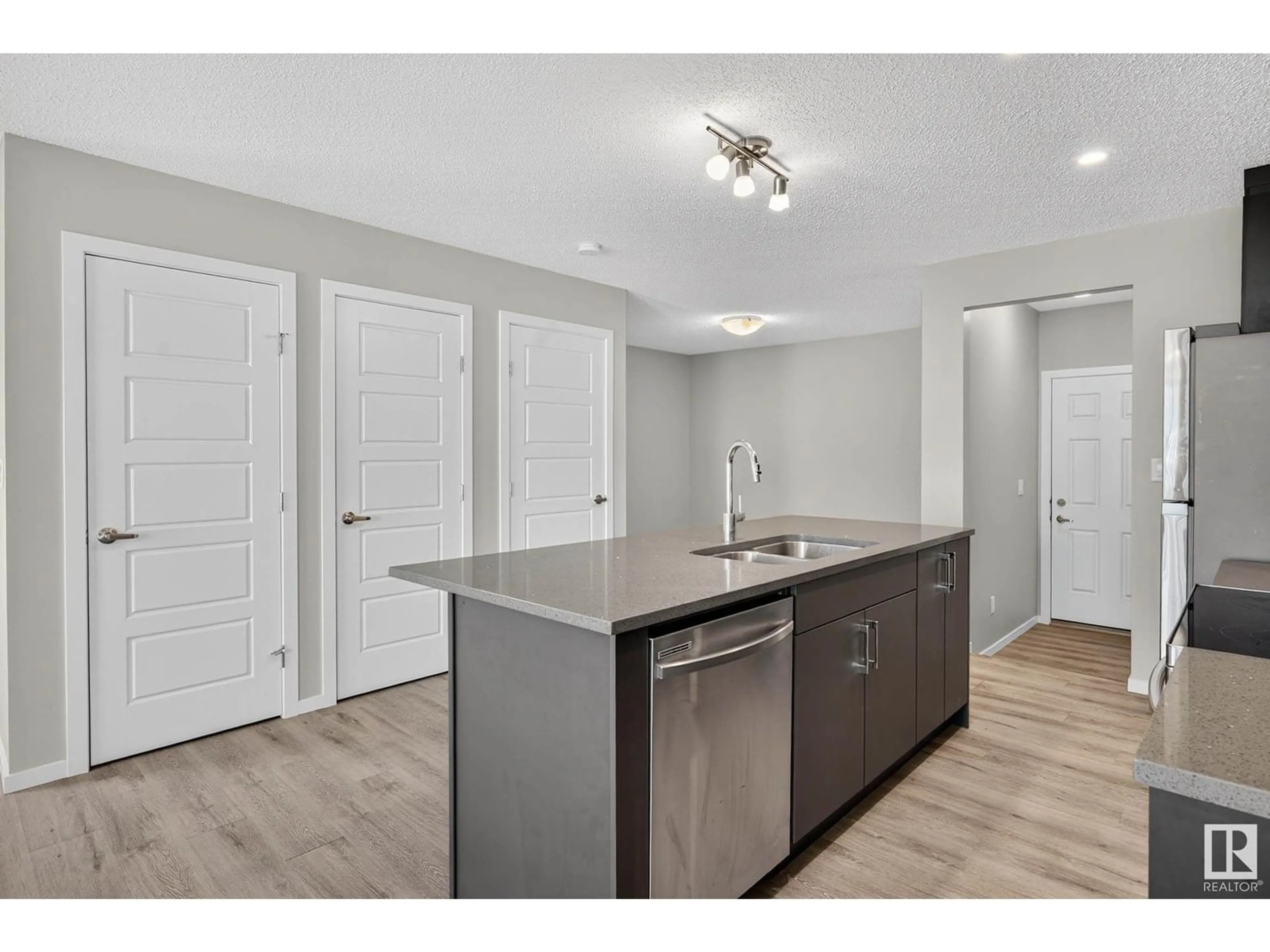 Open concept kitchen, unknown for 20423 21 AV, Edmonton Alberta T6M1M8
