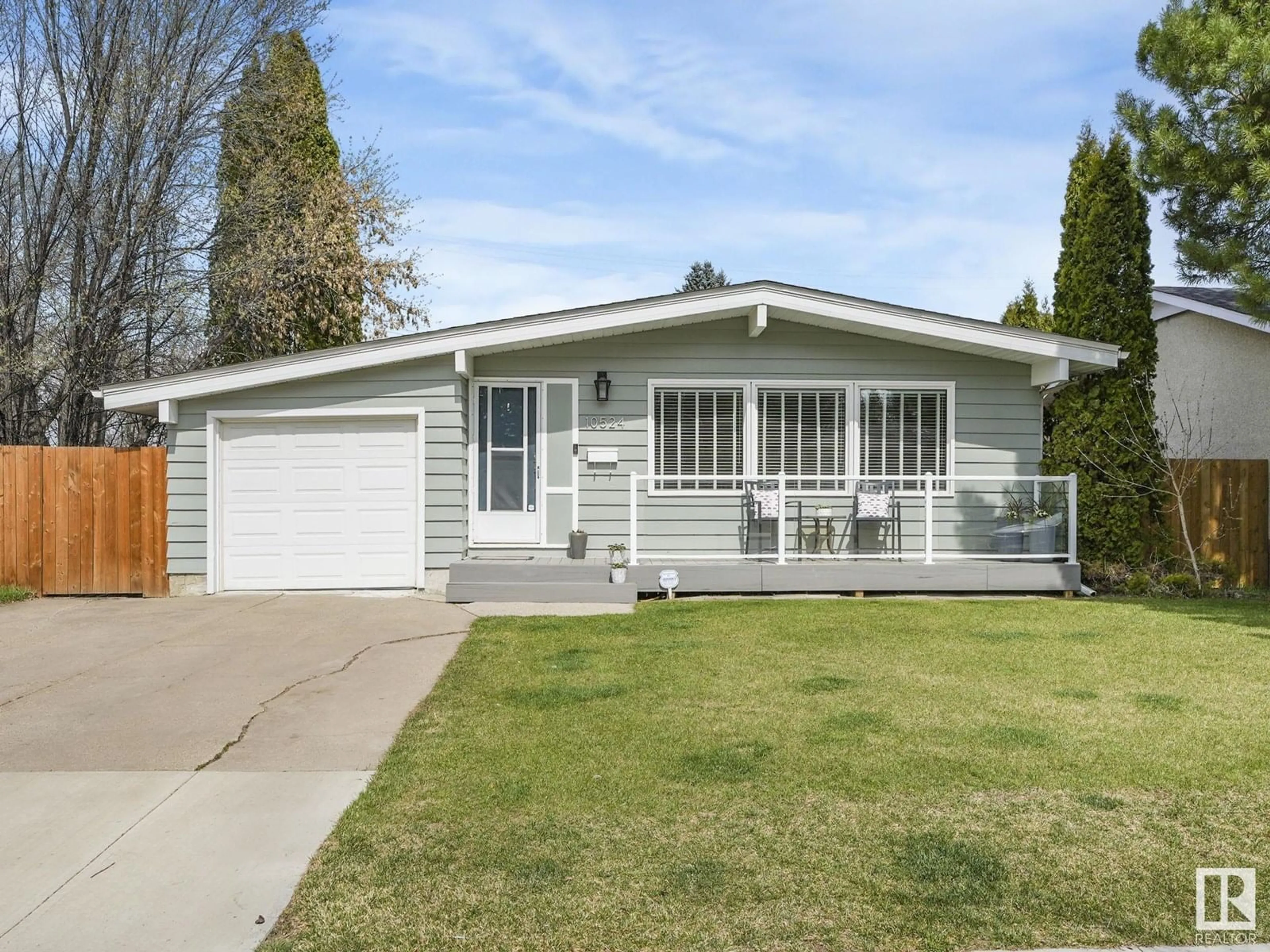 Home with vinyl exterior material, street for 10524 55 AV, Edmonton Alberta T6H0W9