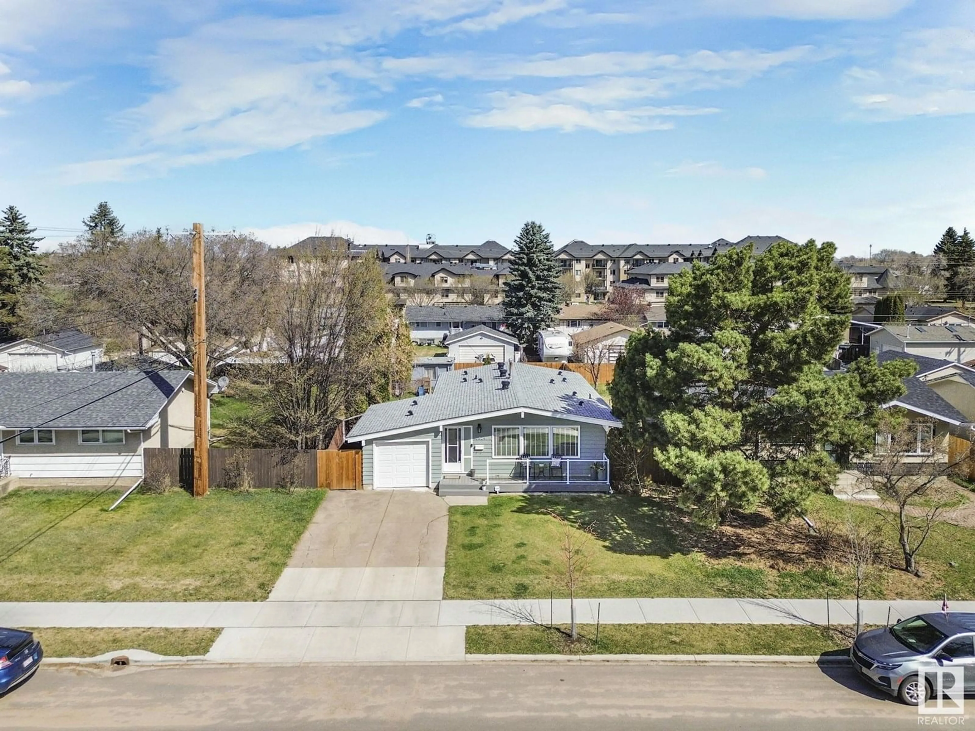A pic from outside/outdoor area/front of a property/back of a property/a pic from drone, street for 10524 55 AV, Edmonton Alberta T6H0W9