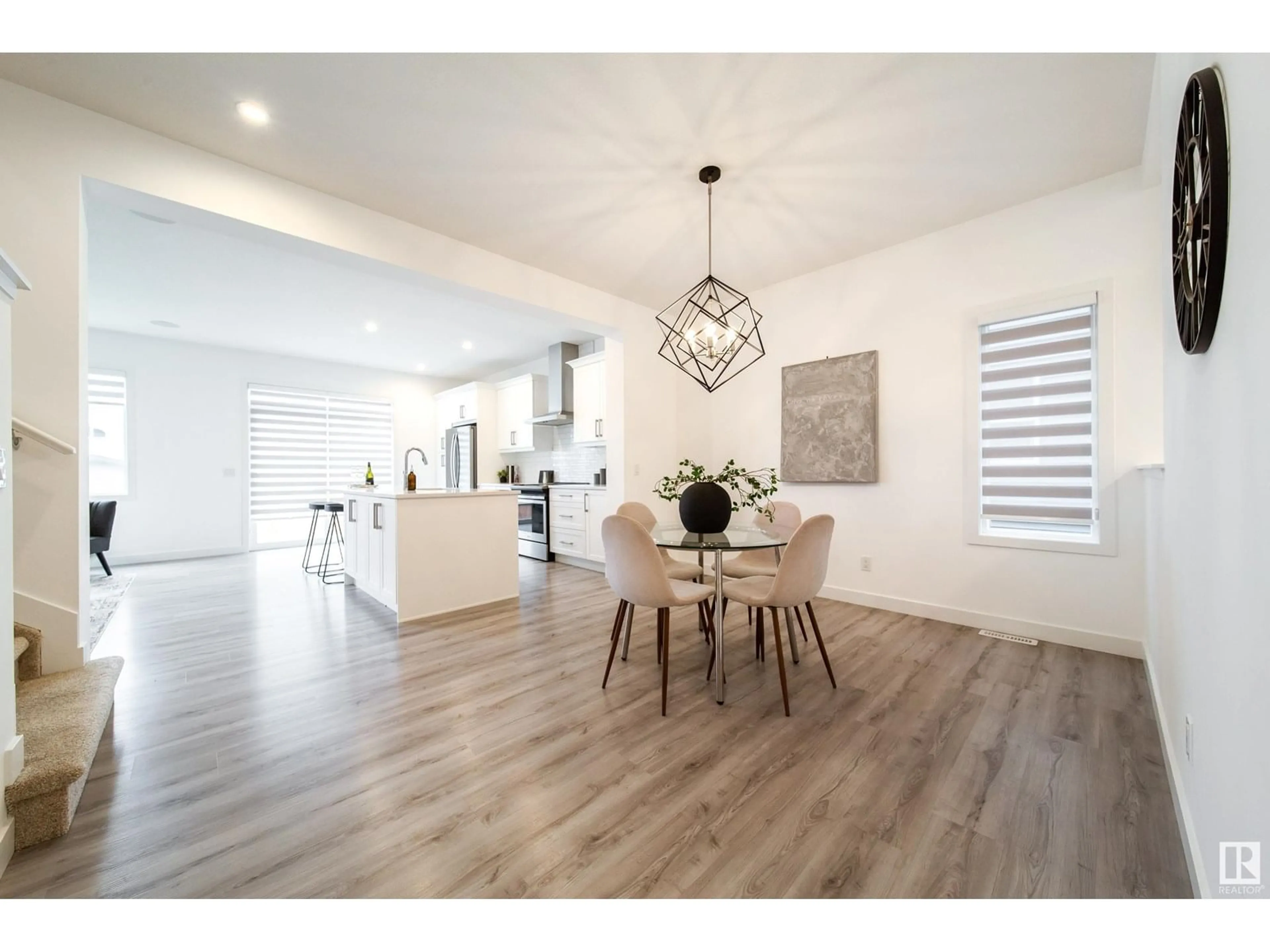 Open concept kitchen, wood/laminate floor for 1466 DARBY GREEN GR, Edmonton Alberta T6W4N5