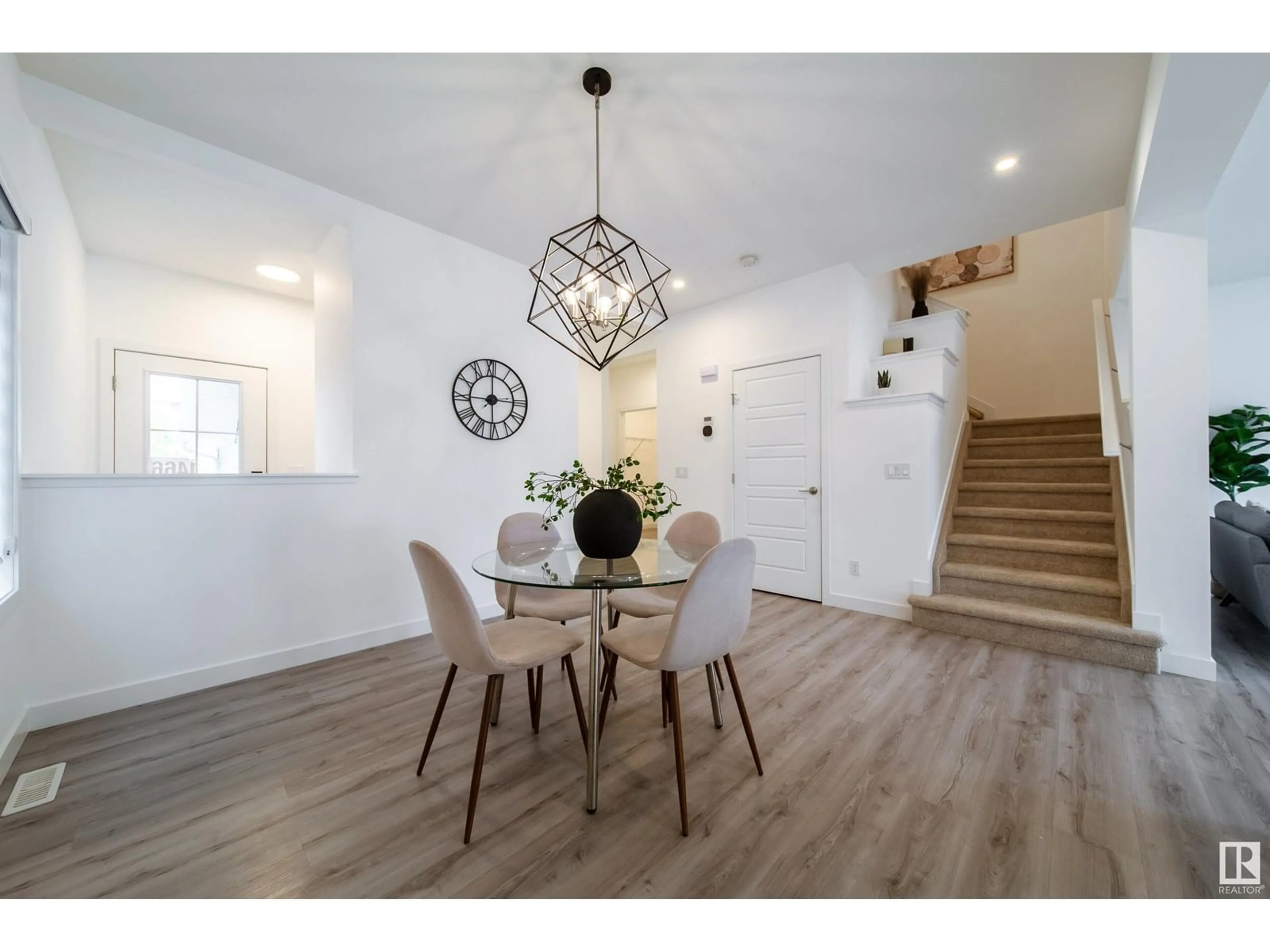 Dining room, wood/laminate floor for 1466 DARBY GREEN GR, Edmonton Alberta T6W4N5