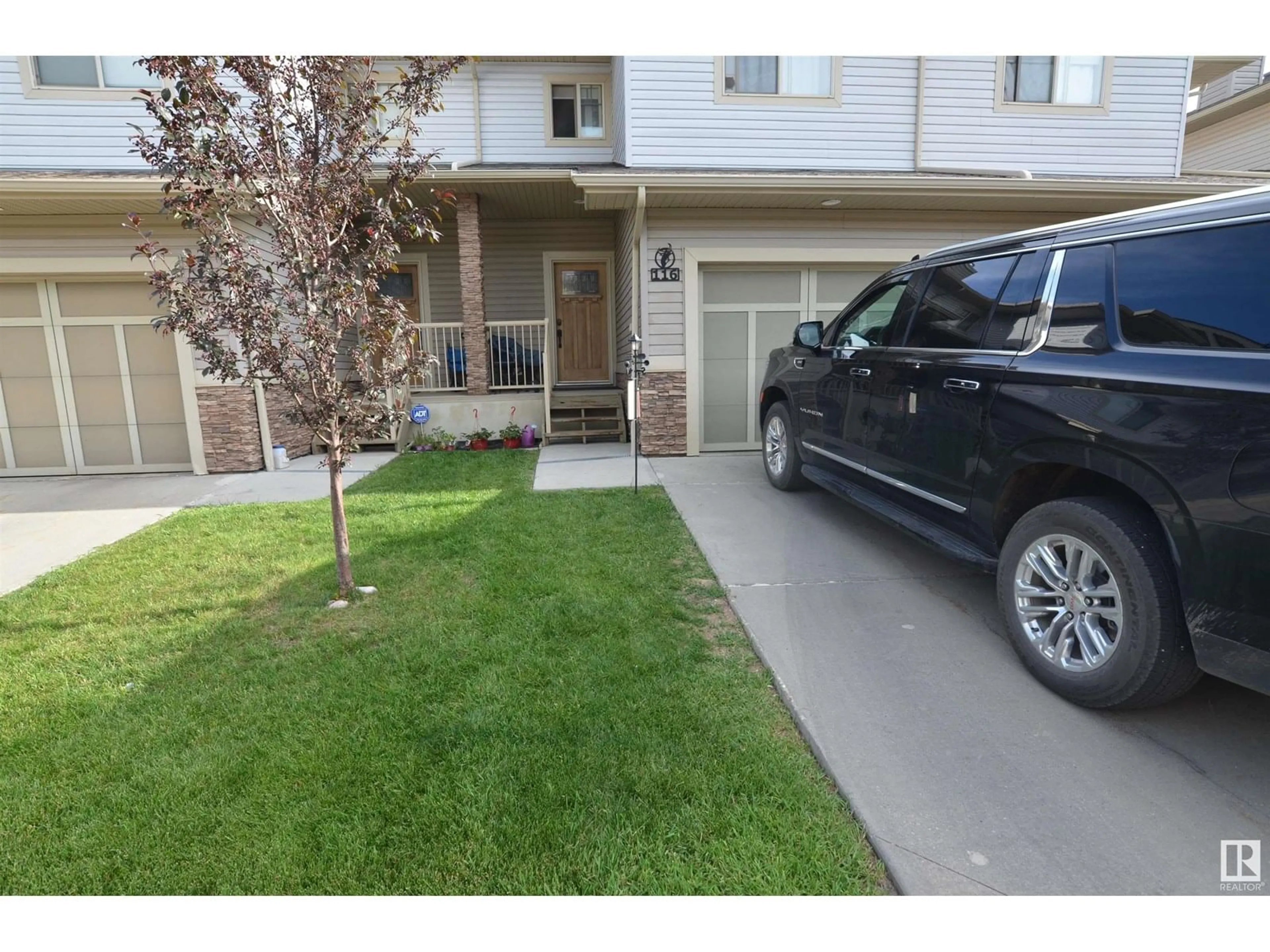 A pic from outside/outdoor area/front of a property/back of a property/a pic from drone, street for 5420 - 116 GRANT MACEWAN BV, Leduc Alberta T9E0M1