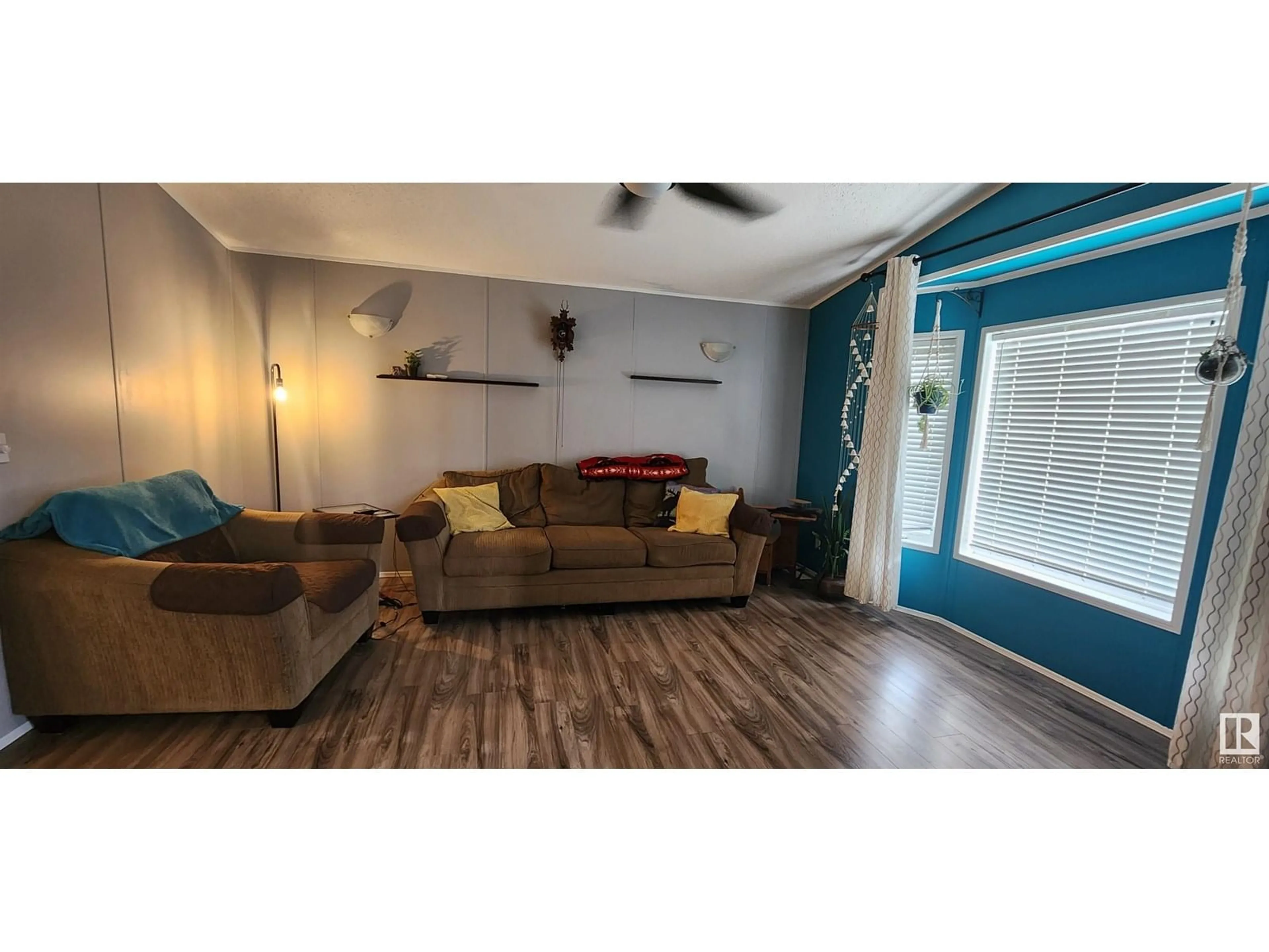 Living room with furniture, wood/laminate floor for #10 - 4850 CENTRE ST, New Sarepta Alberta T0B3M0