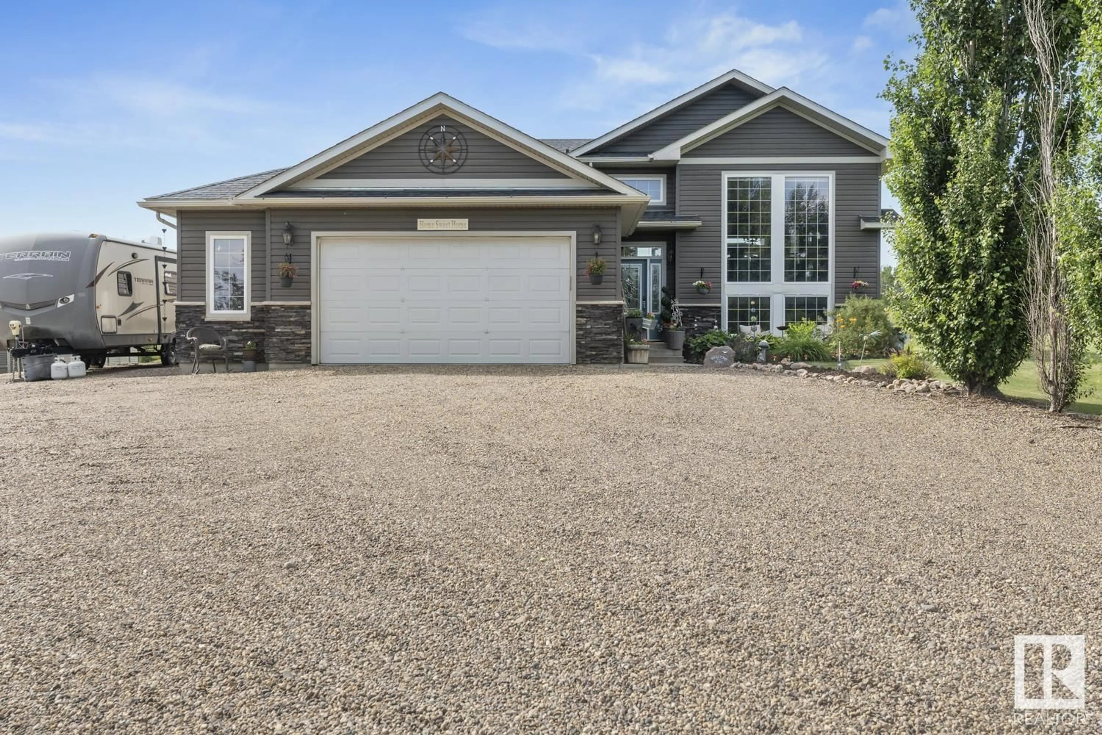 Home with vinyl exterior material, street for 4 TWP RD 624, Rural Bonnyville M.D. Alberta T9M1P3