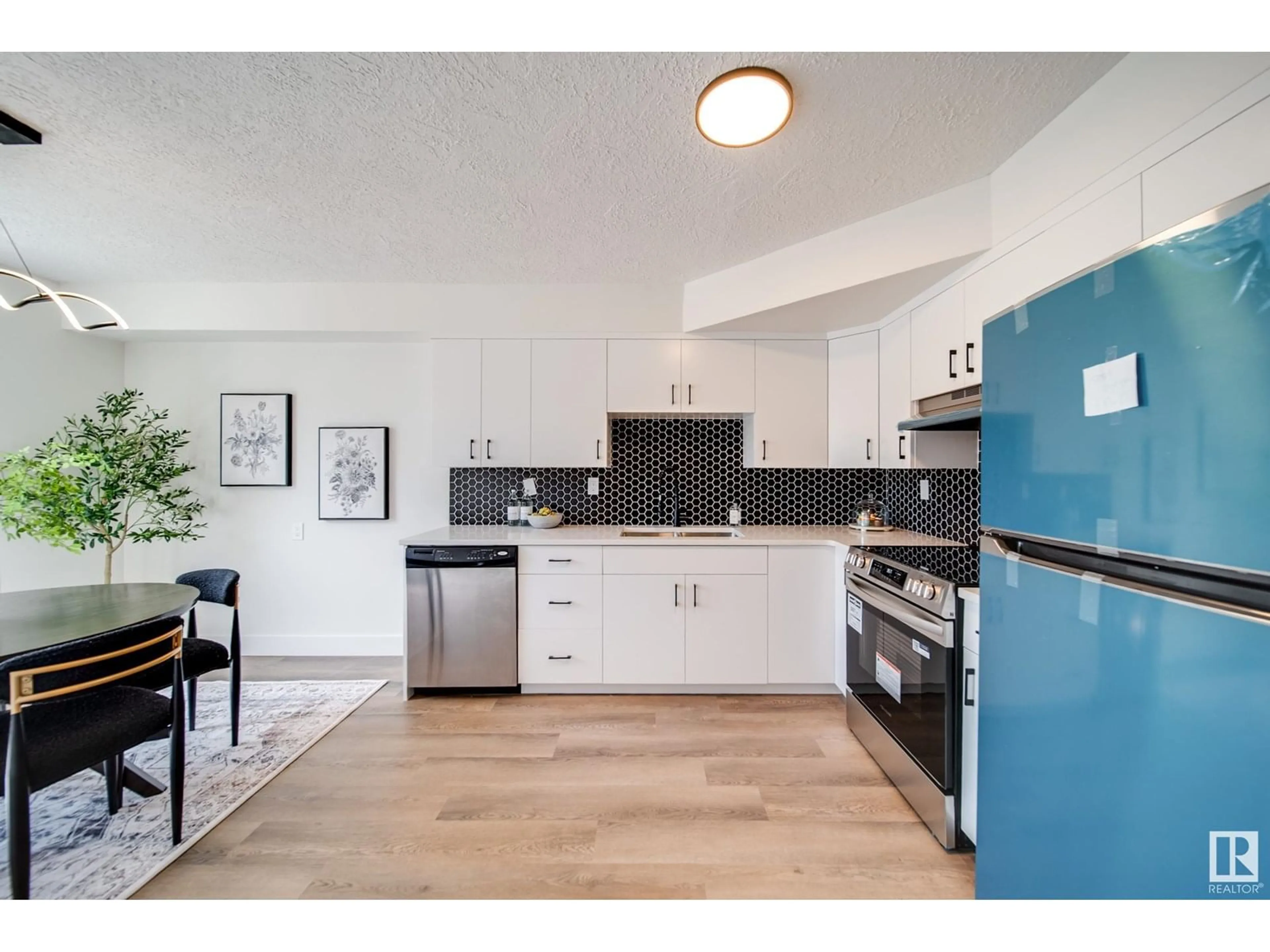 Open concept kitchen, unknown for NW - 13888 24 ST, Edmonton Alberta T5Y1B6