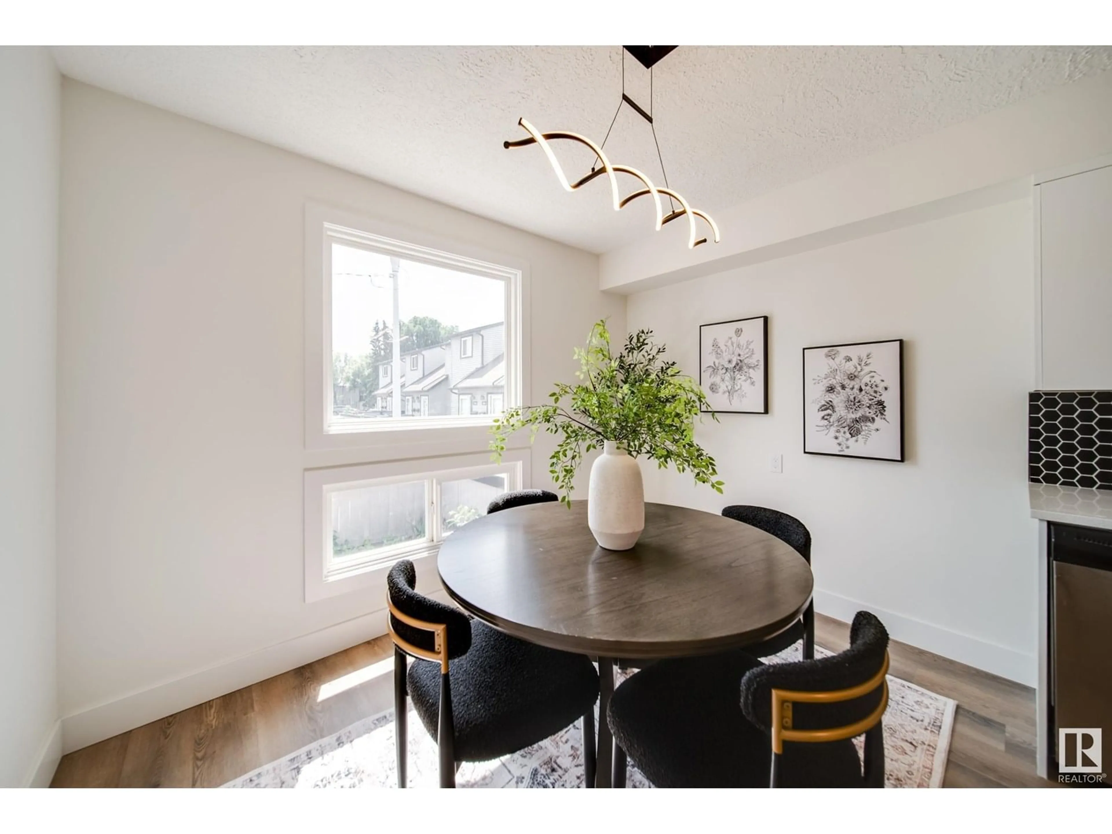 Dining room, wood/laminate floor for NW - 13888 24 ST, Edmonton Alberta T5Y1B6