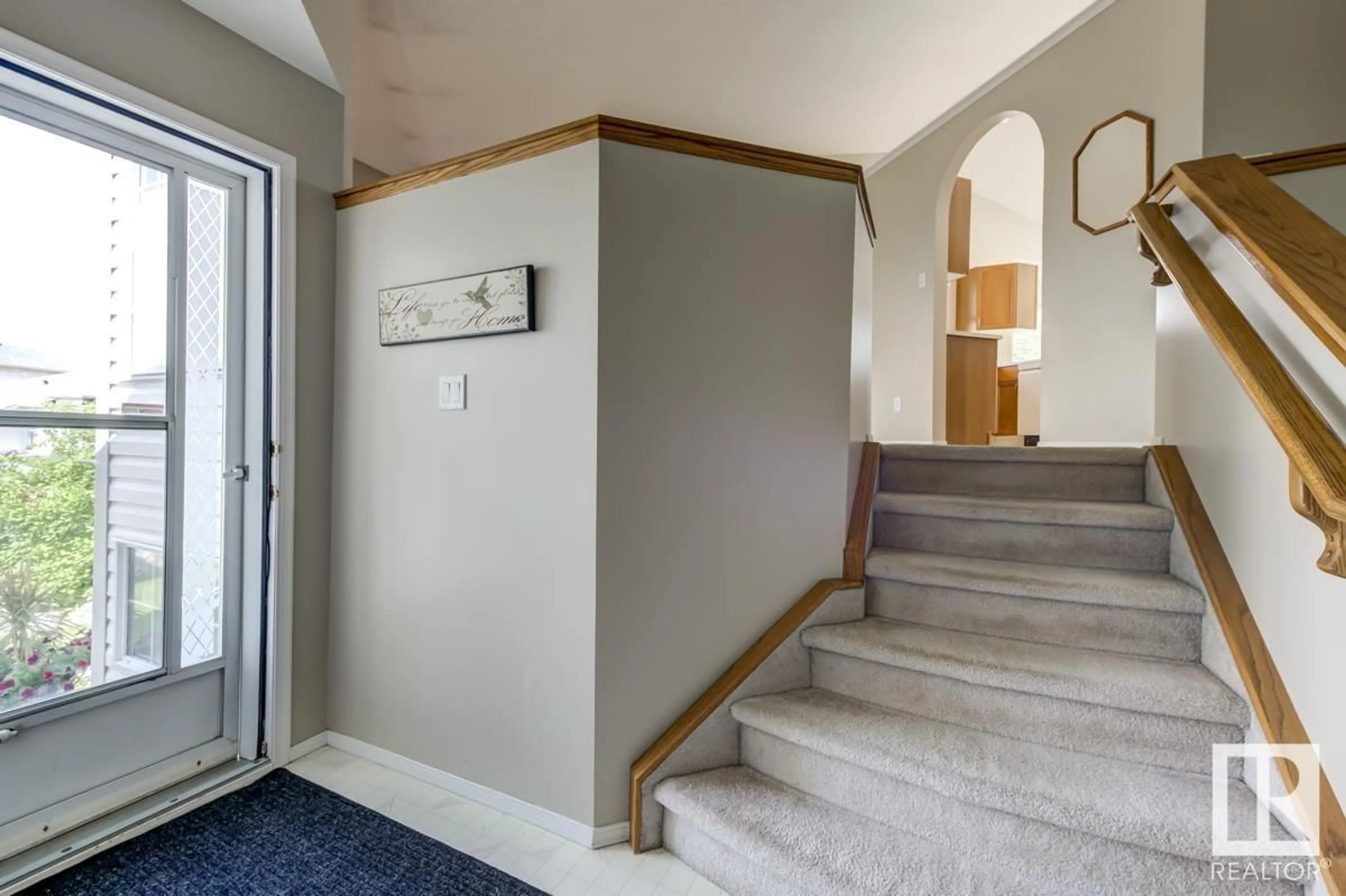 Indoor entryway for 143 HOLLICK-KENYON WY, Edmonton Alberta T5Y2V7