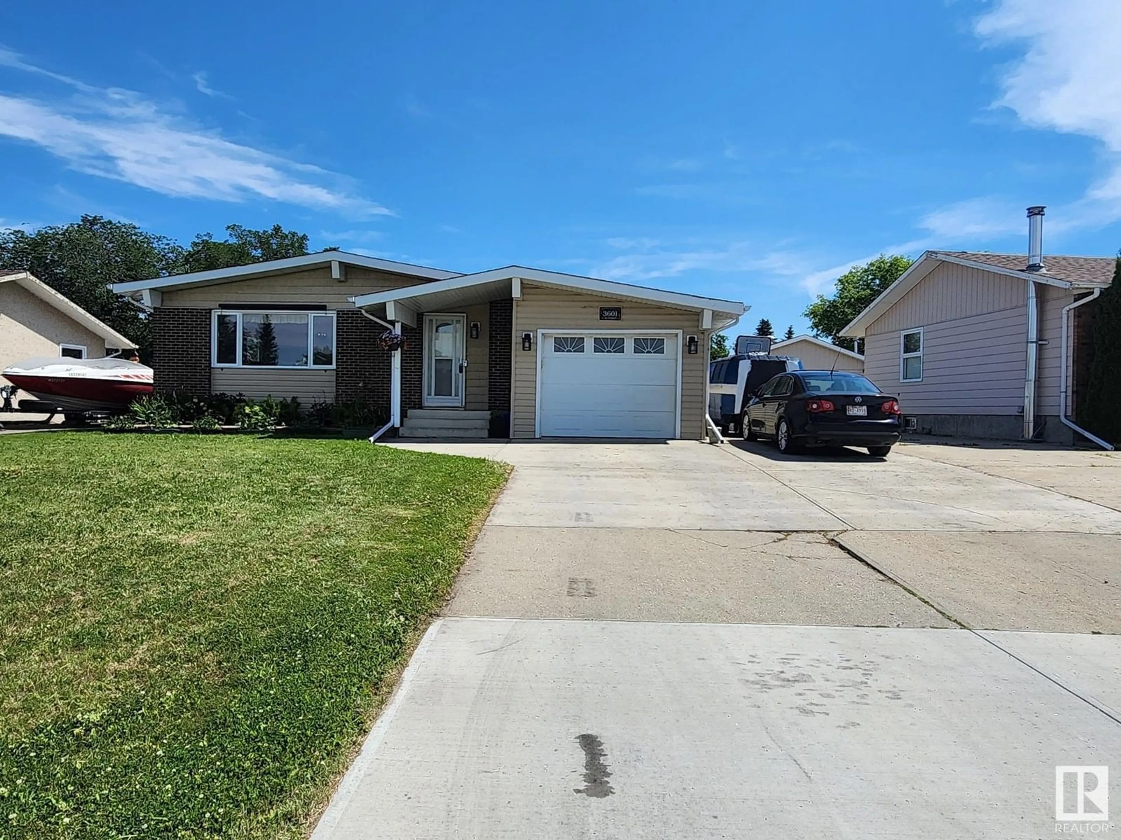 Home with vinyl exterior material, street for 3601 42 ST, Leduc Alberta T9E6A7