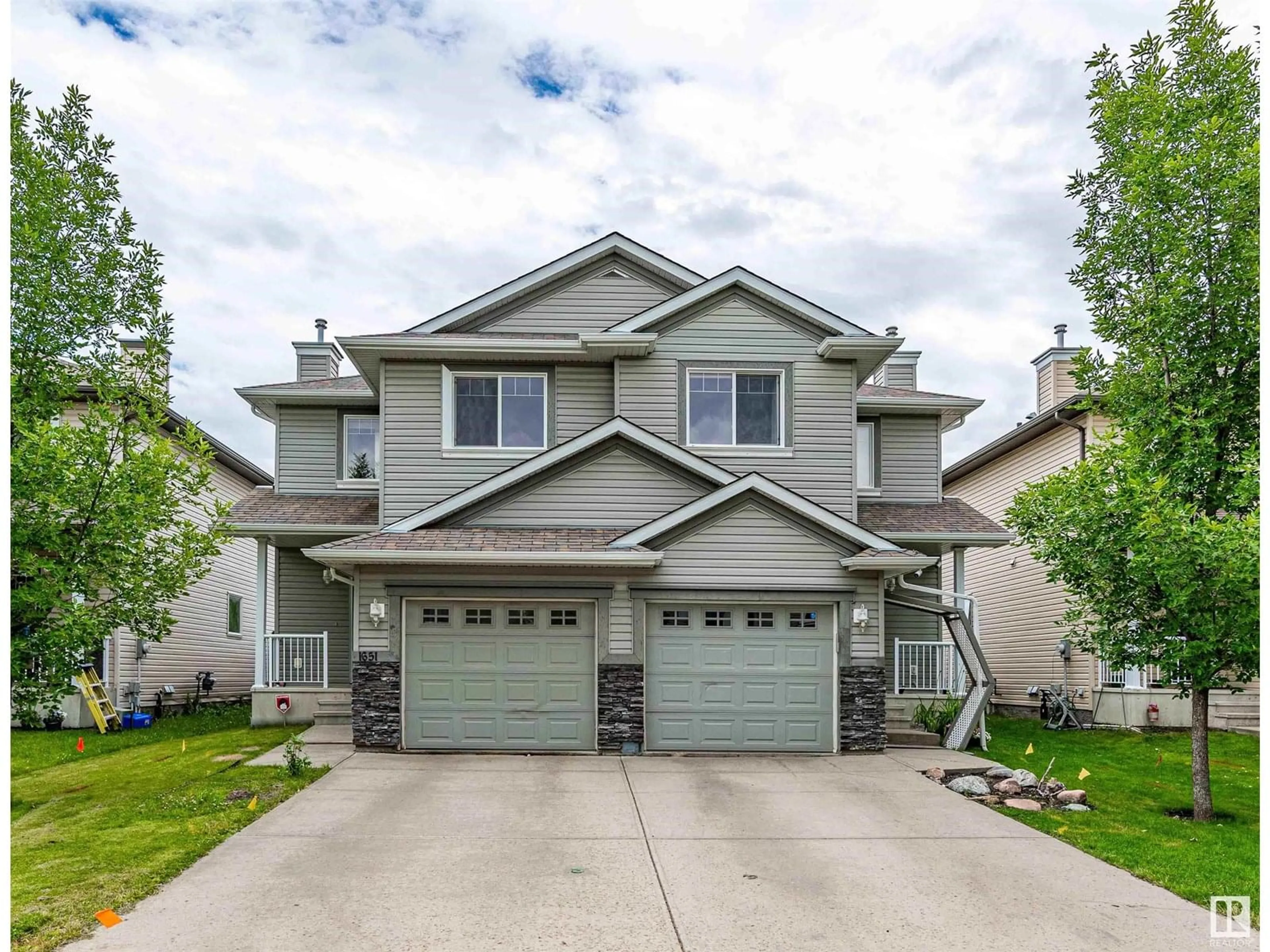 Home with vinyl exterior material, street for SW - 1651 MELROSE PL, Edmonton Alberta T6W1X5