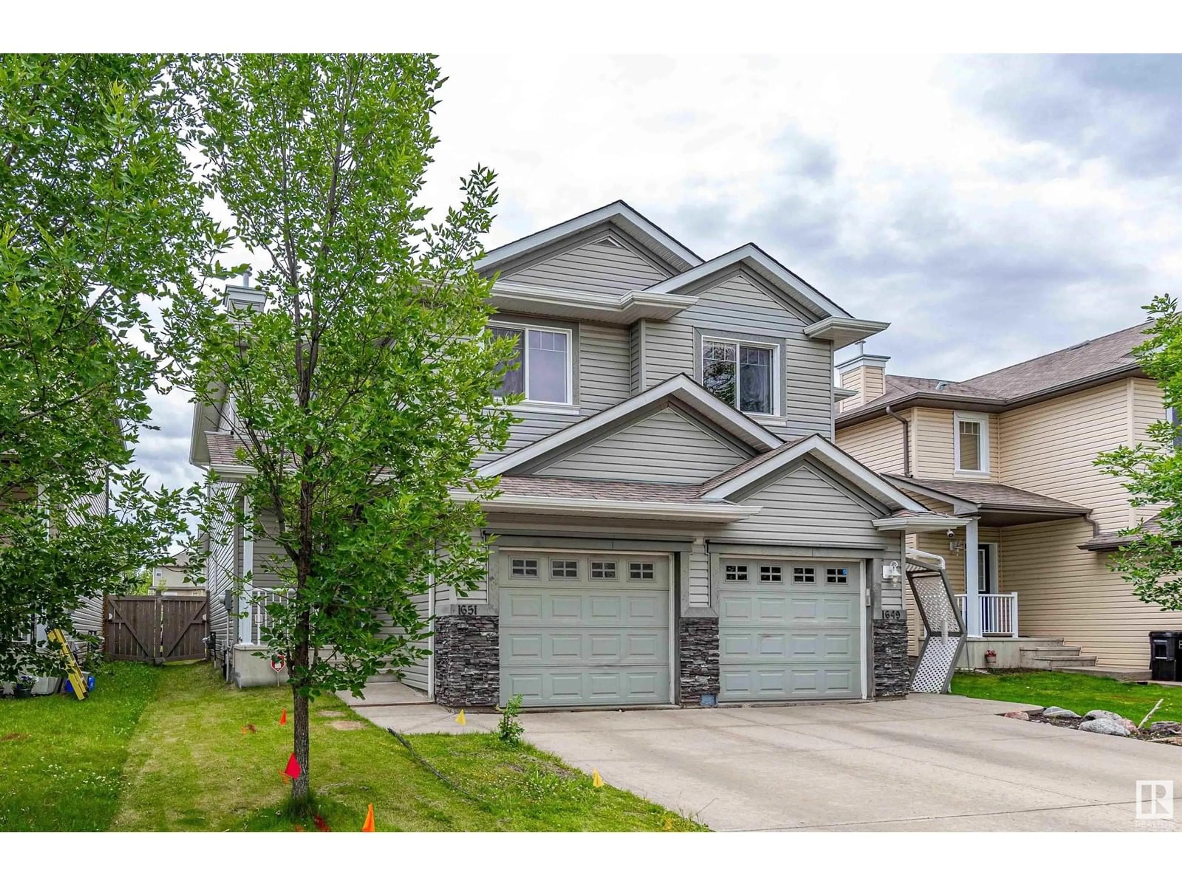 Home with vinyl exterior material, street for SW - 1651 MELROSE PL, Edmonton Alberta T6W1X5
