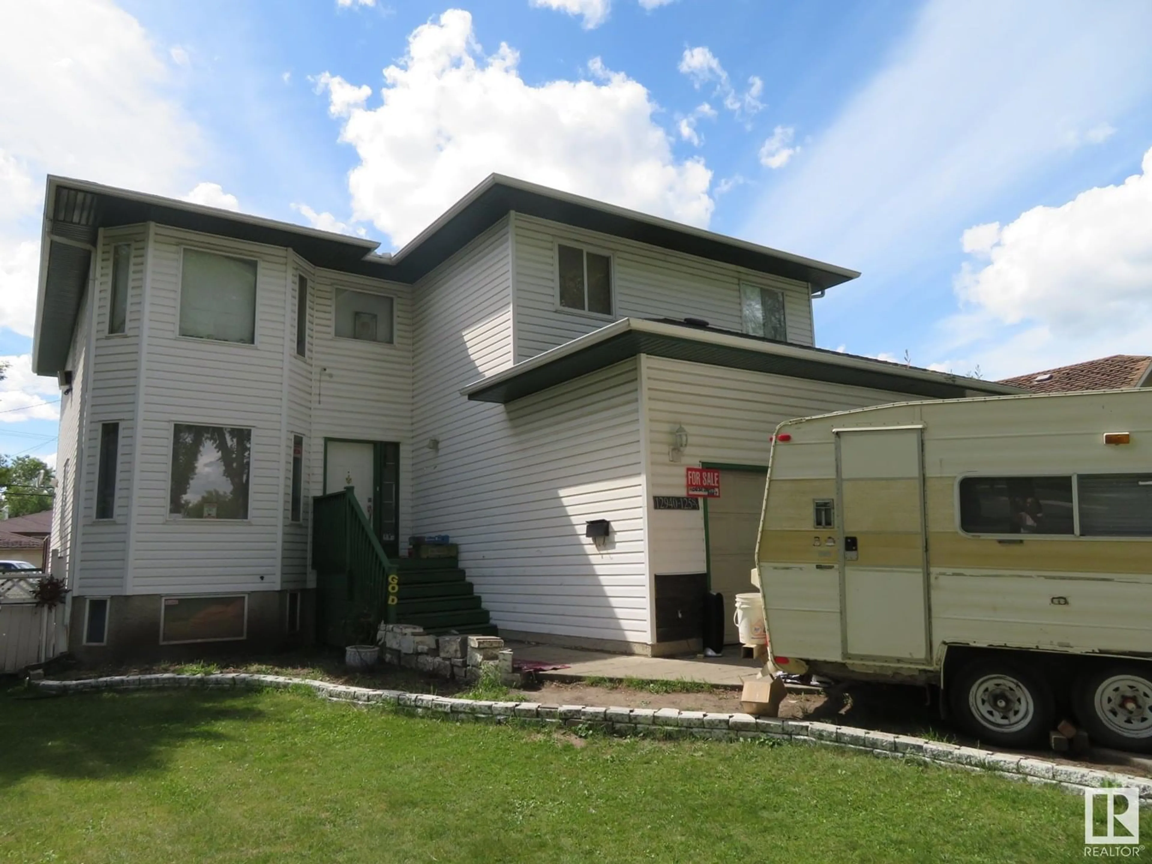 Home with vinyl exterior material, building for NW - 12940 125 ST, Edmonton Alberta T5L0V2