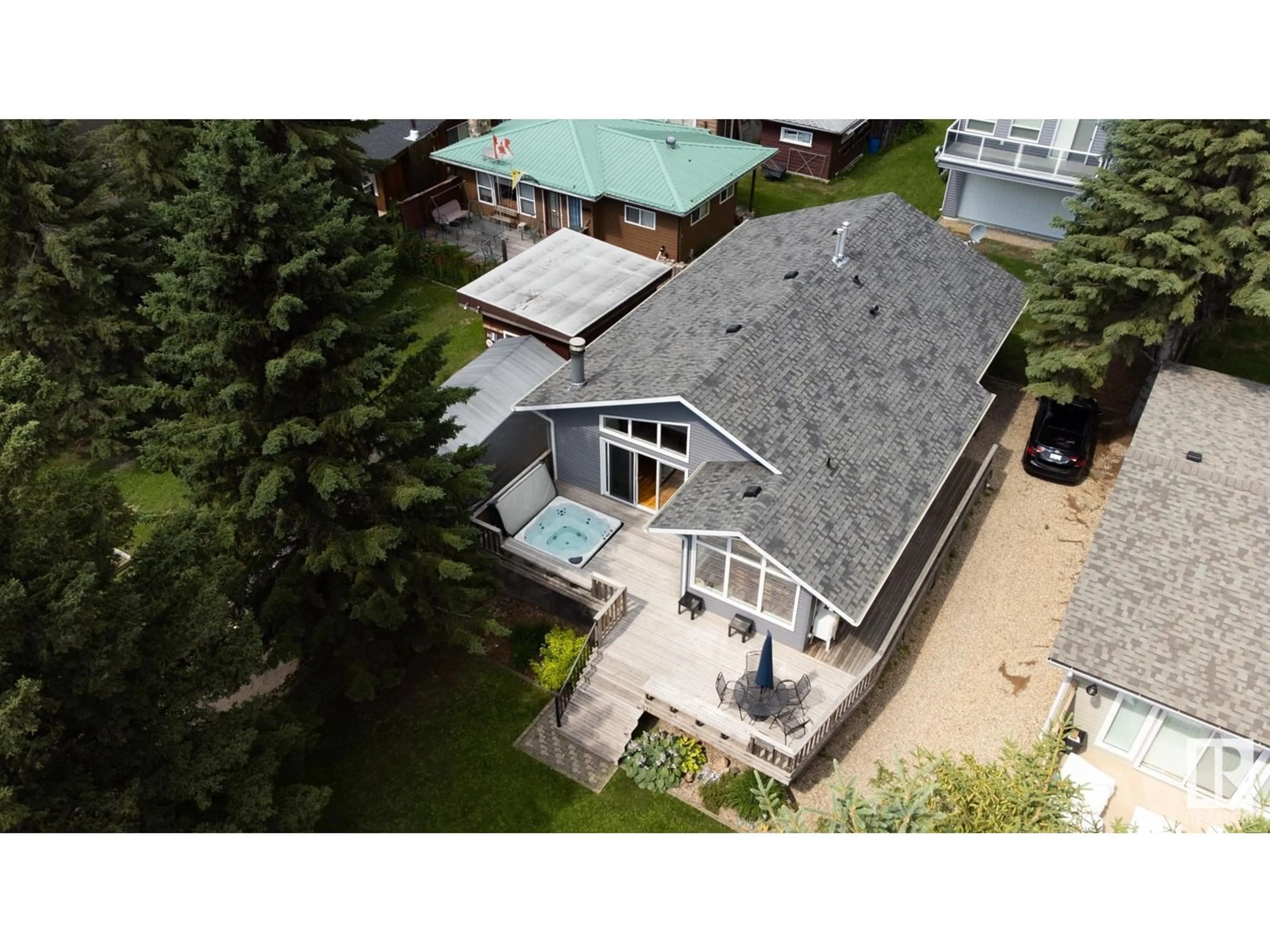 A pic from outside/outdoor area/front of a property/back of a property/a pic from drone, unknown for 31 LAKESHORE DR, Rural Leduc County Alberta T0C2P0