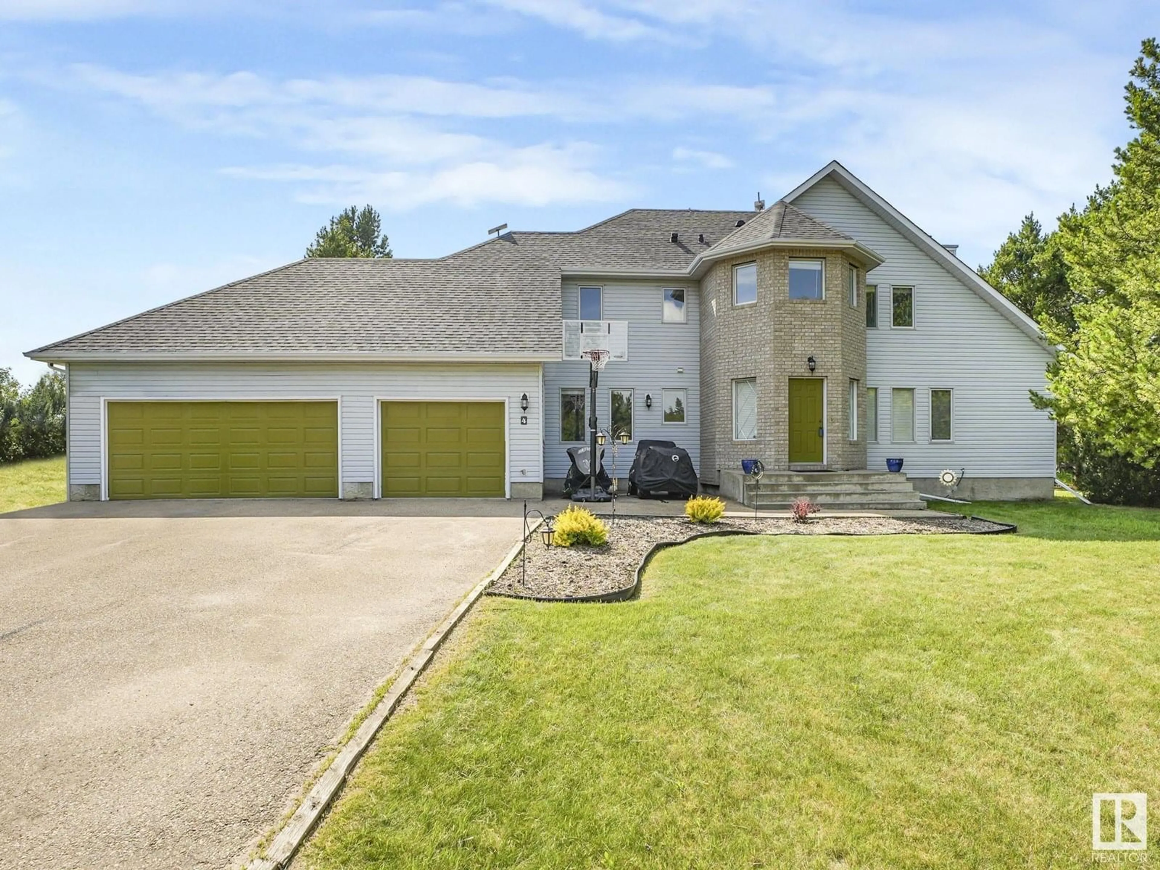 Home with brick exterior material, street for 4 VISTA WY, Rural Sturgeon County Alberta T0A1N0