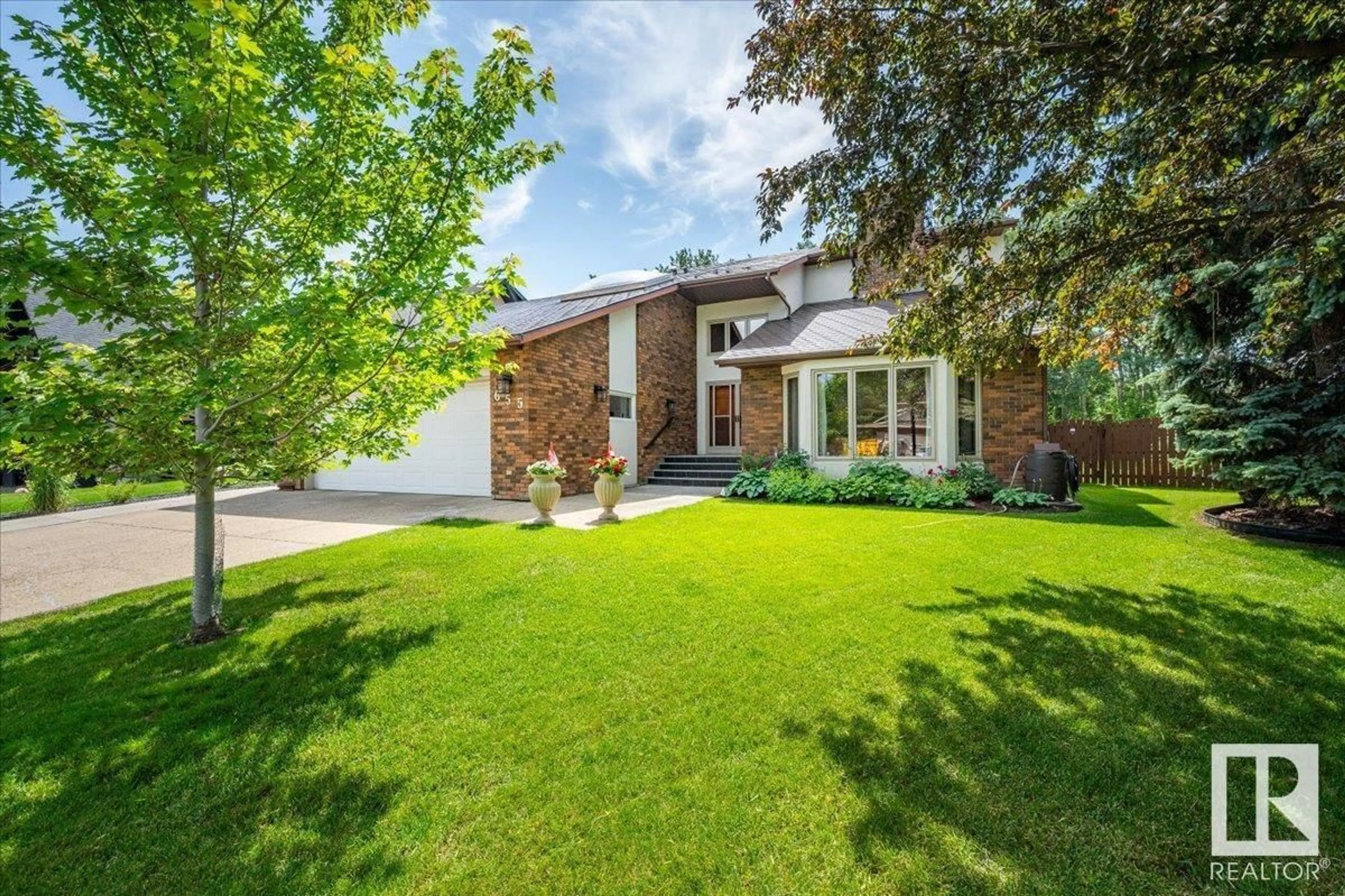 Home with brick exterior material, street for 655 ROMANIUK RD, Edmonton Alberta T6R1A5