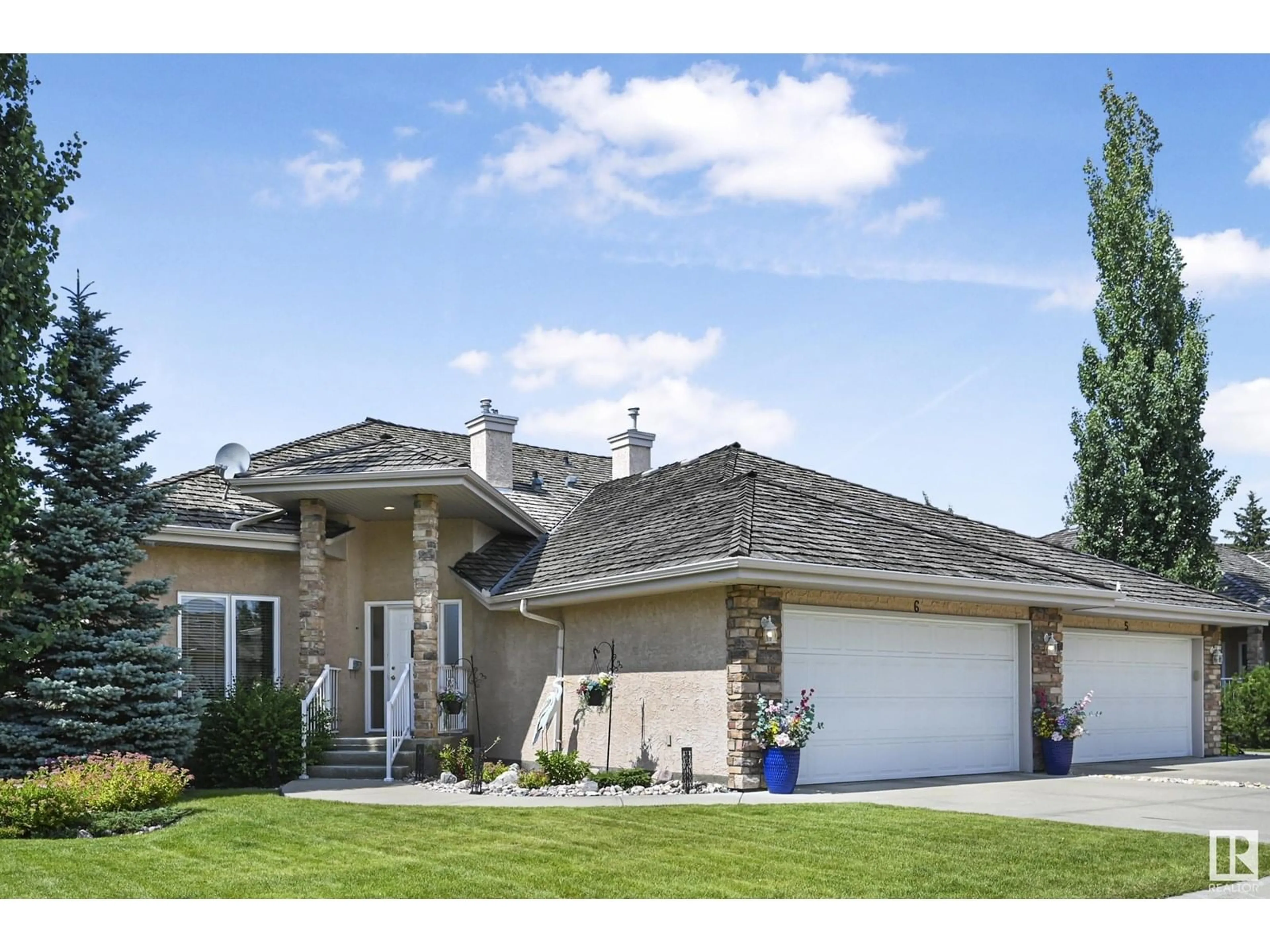 Home with vinyl exterior material, street for #6 - 409 HUNTERS GREEN GR, Edmonton Alberta T6R2Z1