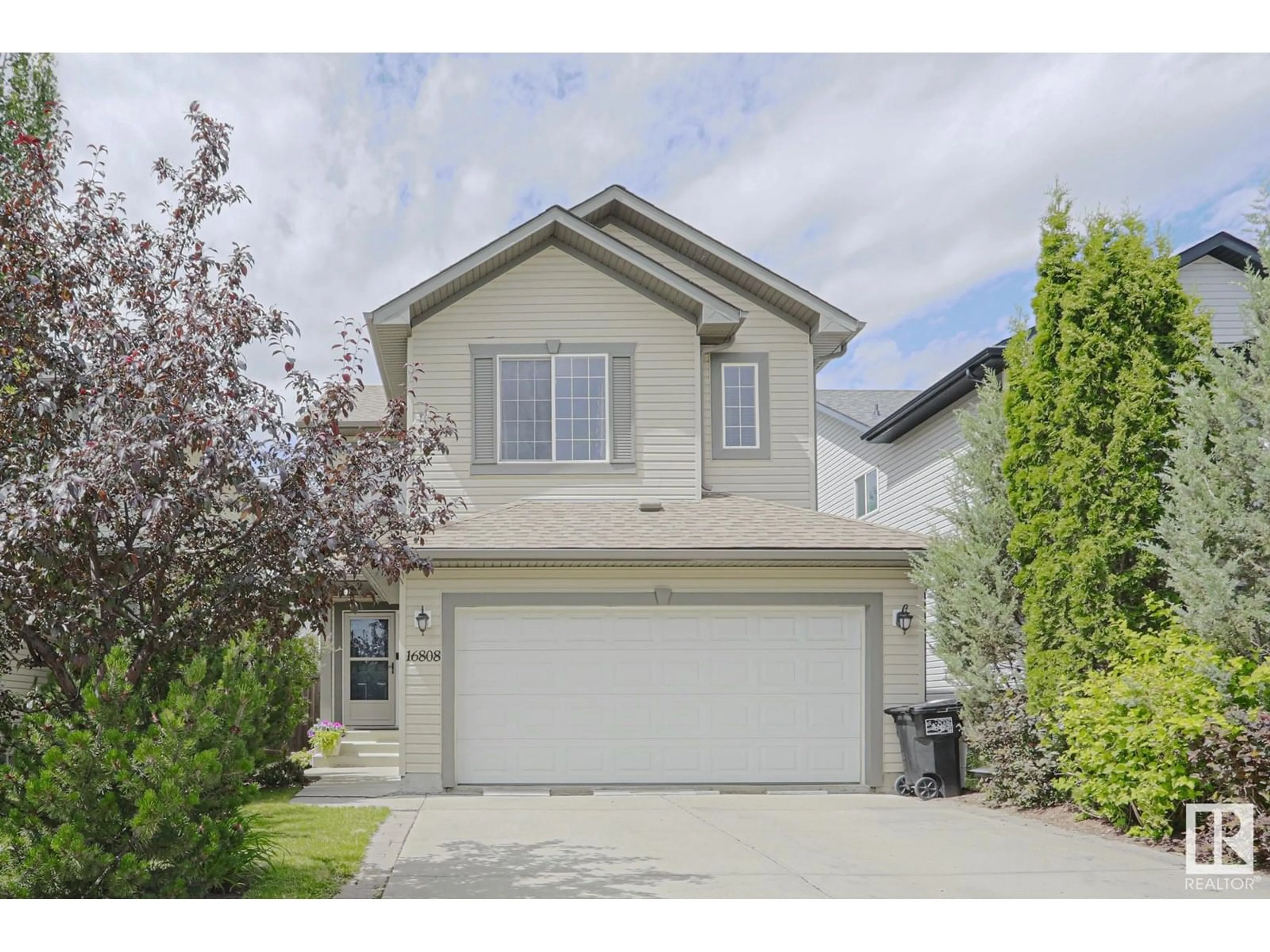 Home with vinyl exterior material, street for 16808 119 ST, Edmonton Alberta T5X6K4