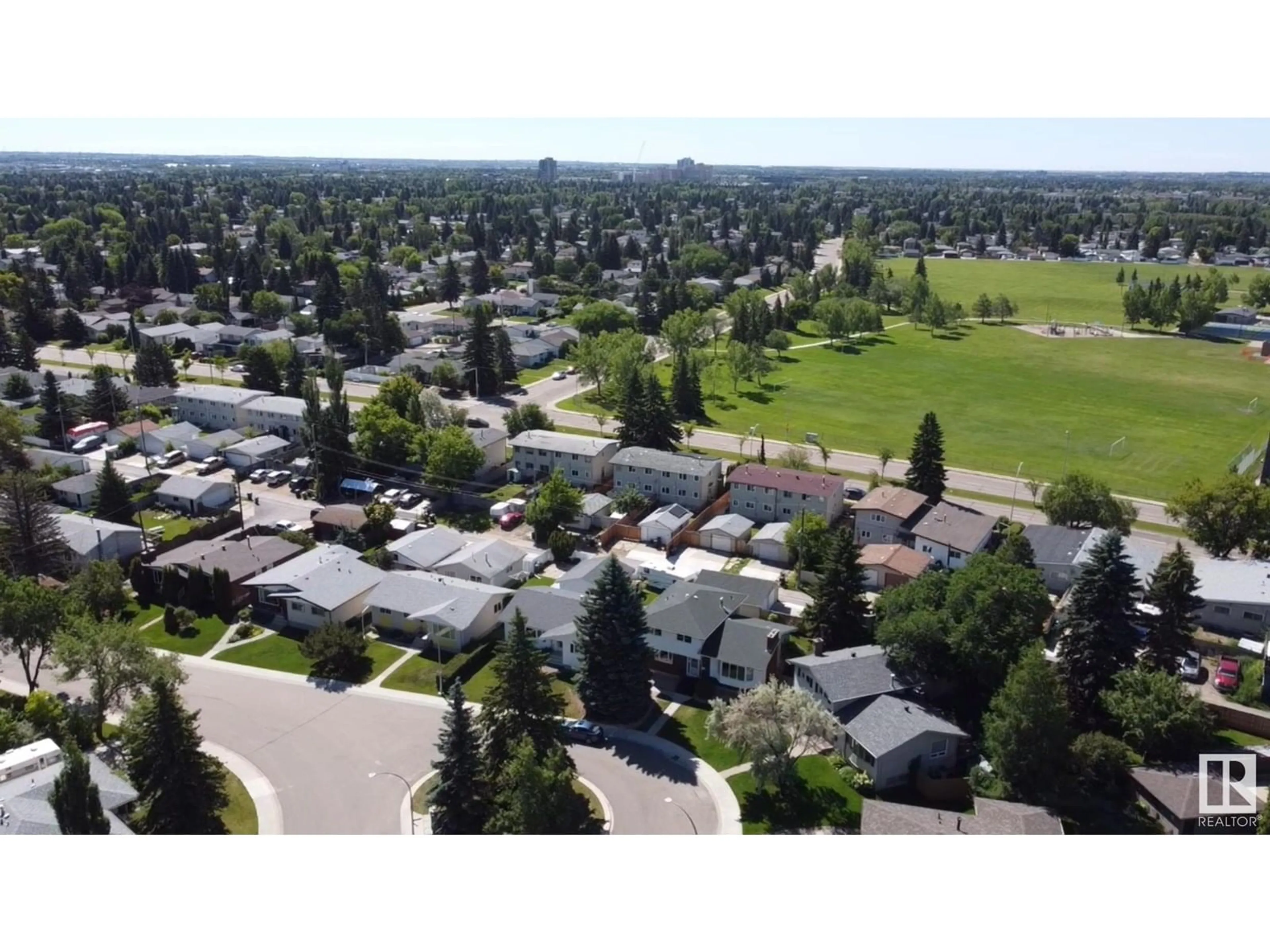 A pic from outside/outdoor area/front of a property/back of a property/a pic from drone, mountain view for 11251 41 AV, Edmonton Alberta T6J0T6