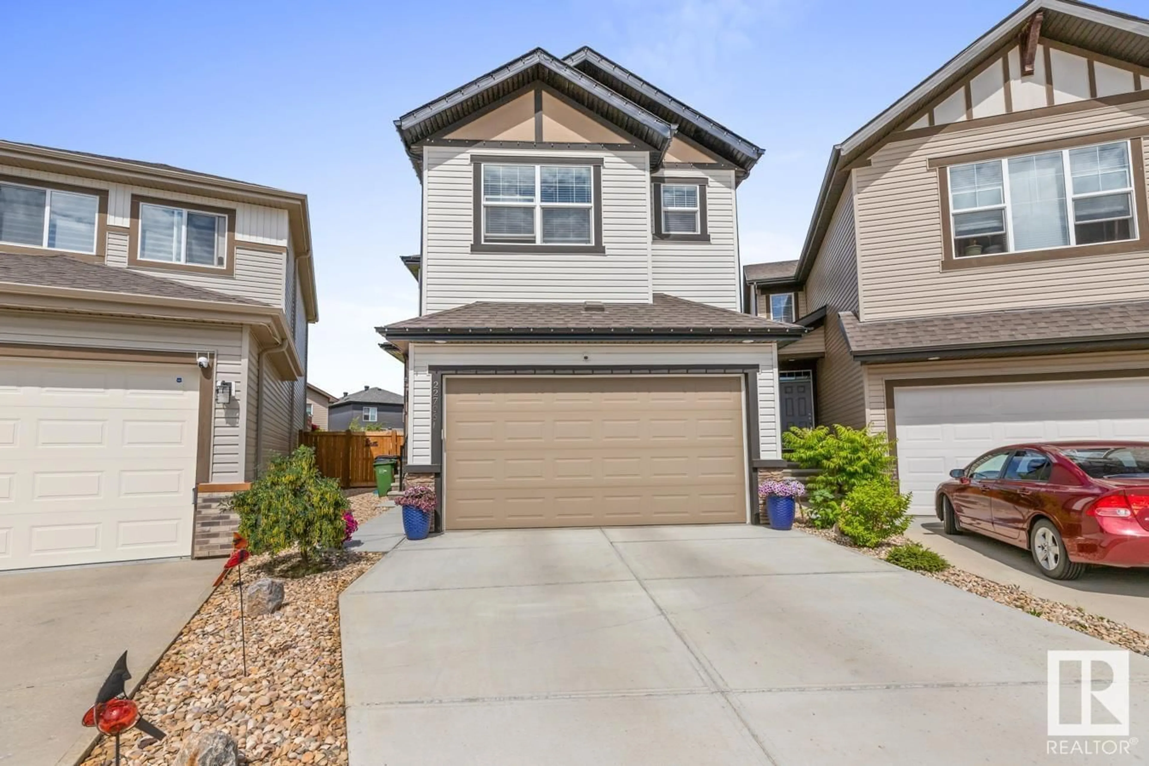 Home with vinyl exterior material, street for 22706 95A AV, Edmonton Alberta T5T7H4