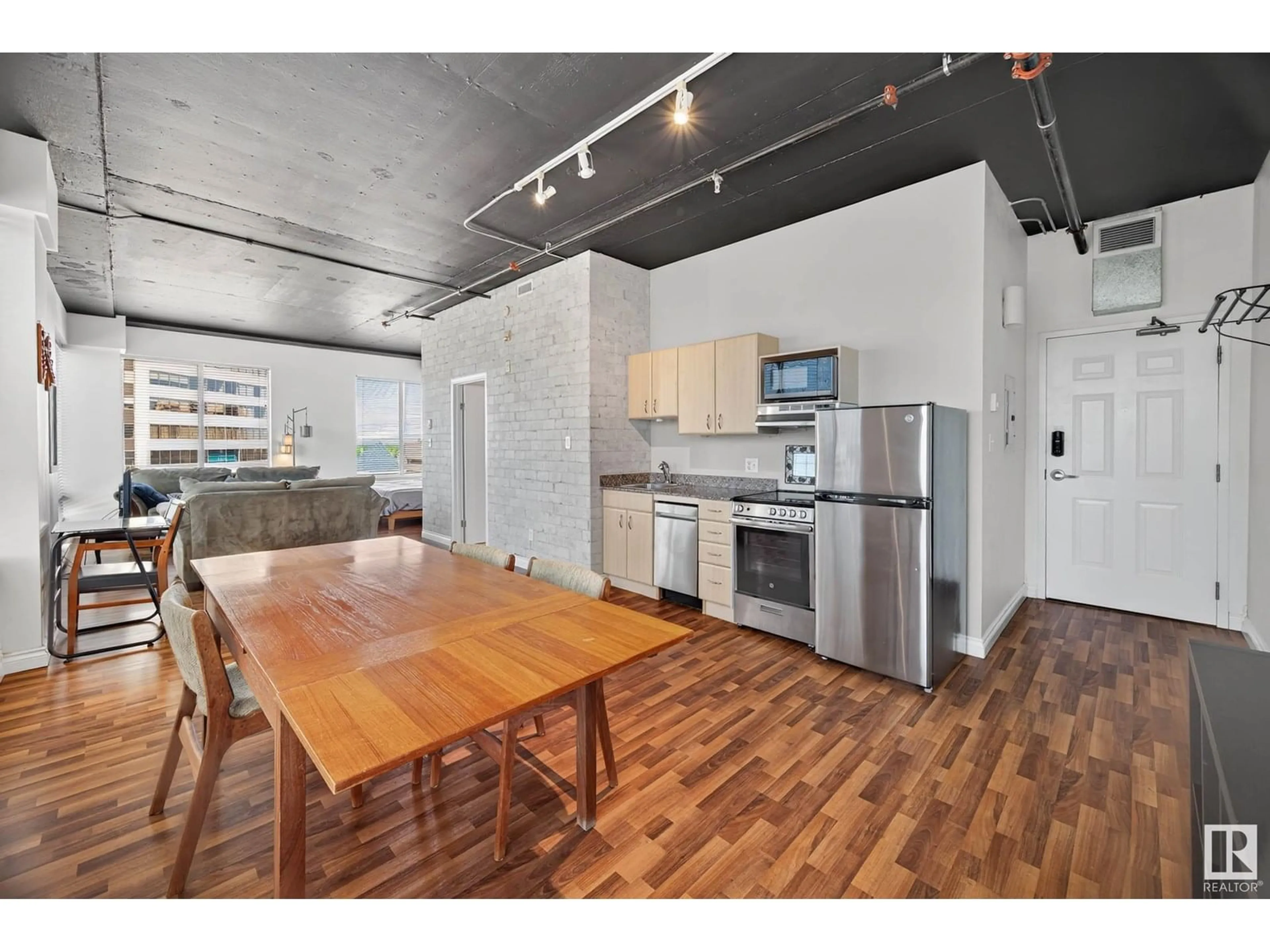 Open concept kitchen, unknown for 1205 JASPER AV, Edmonton Alberta T5J1R9