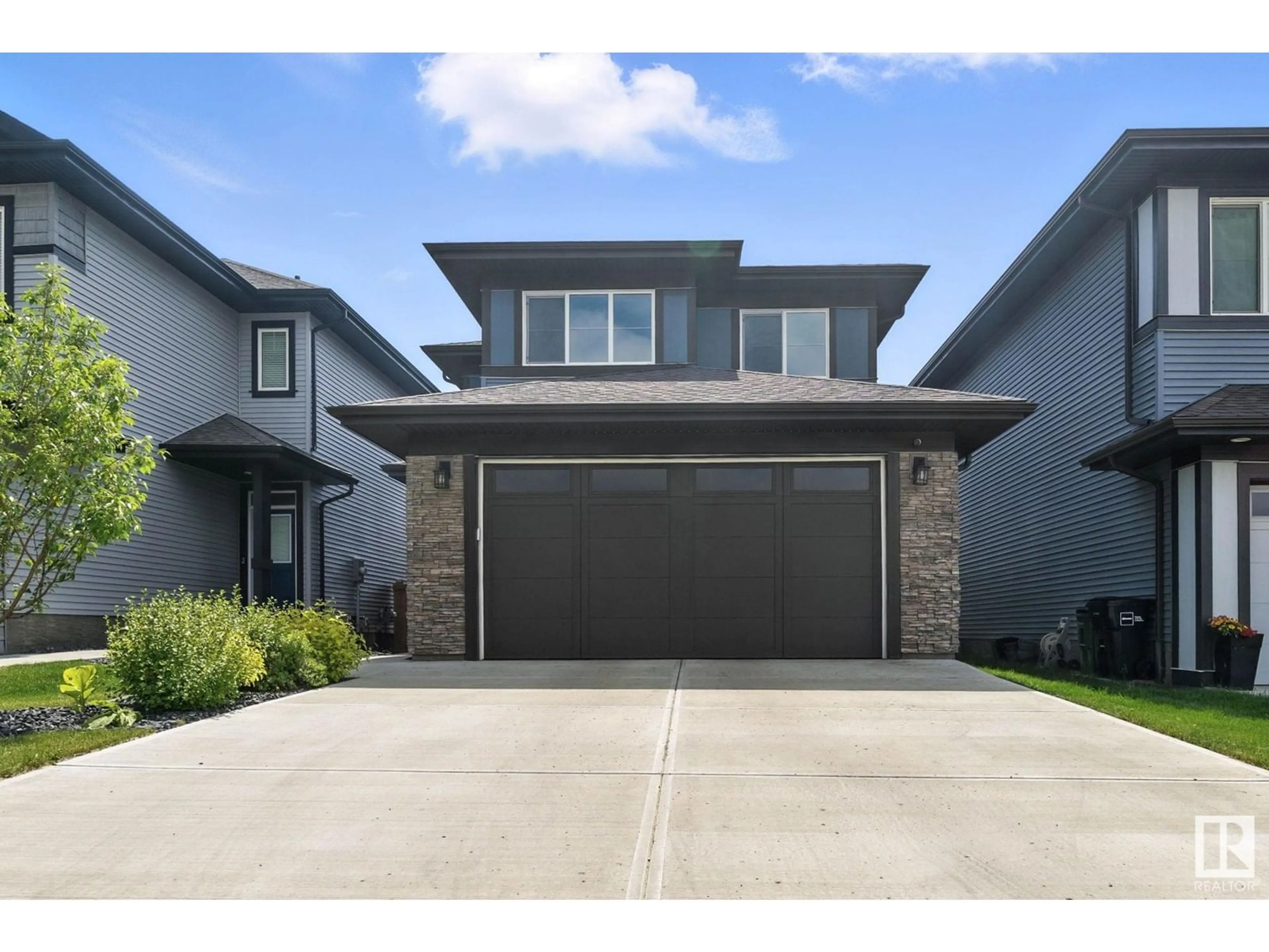 Home with brick exterior material, street for 643 EAGLESON CR, Edmonton Alberta T6M0Z5