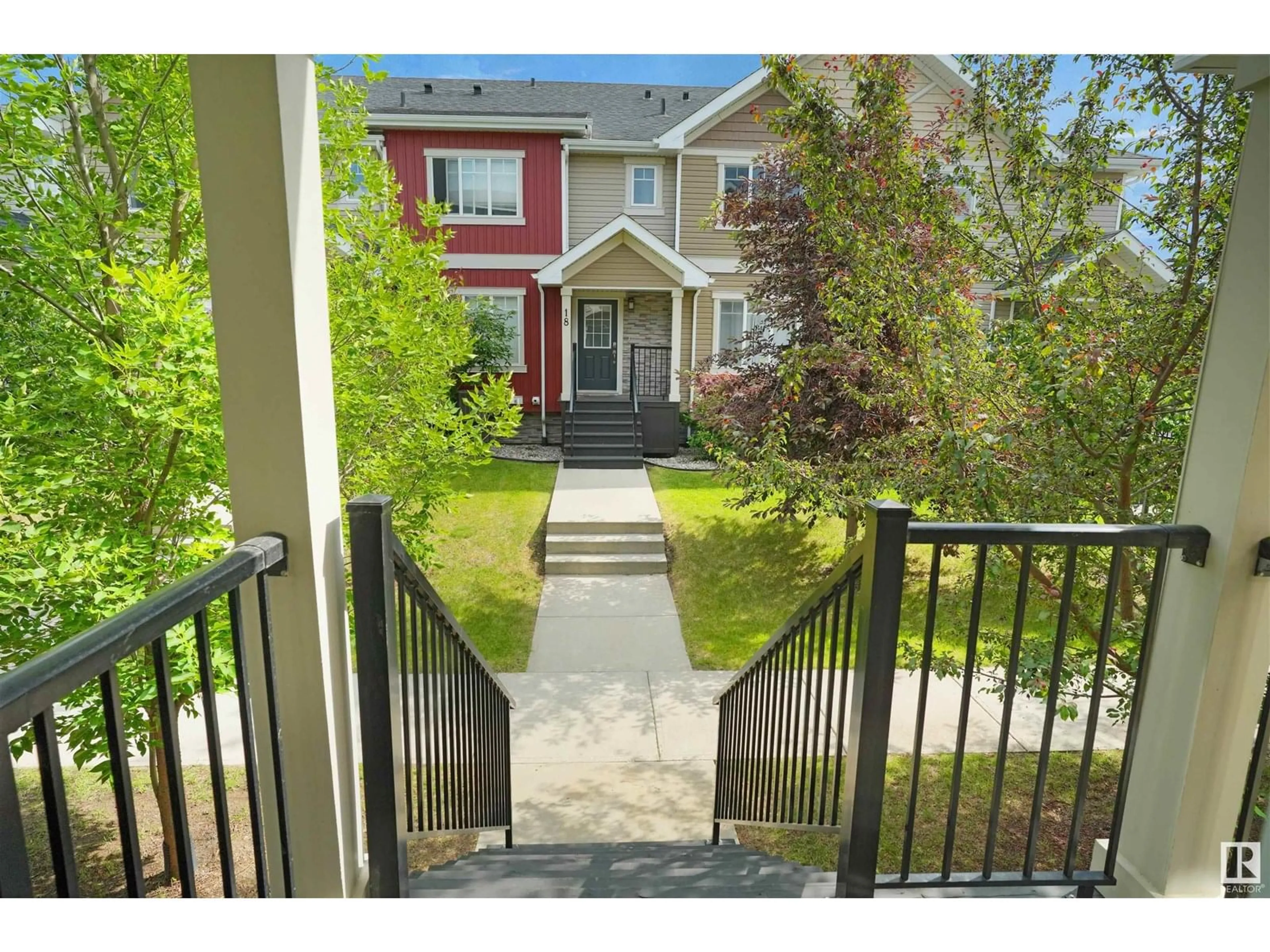 A pic from outside/outdoor area/front of a property/back of a property/a pic from drone, street for 33 9535 217 ST NW, Edmonton Alberta T5T4P5